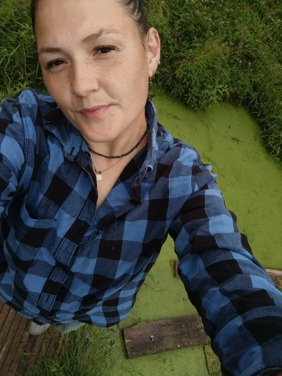Exploring a duckweed pond in rural Karsha, Russia
