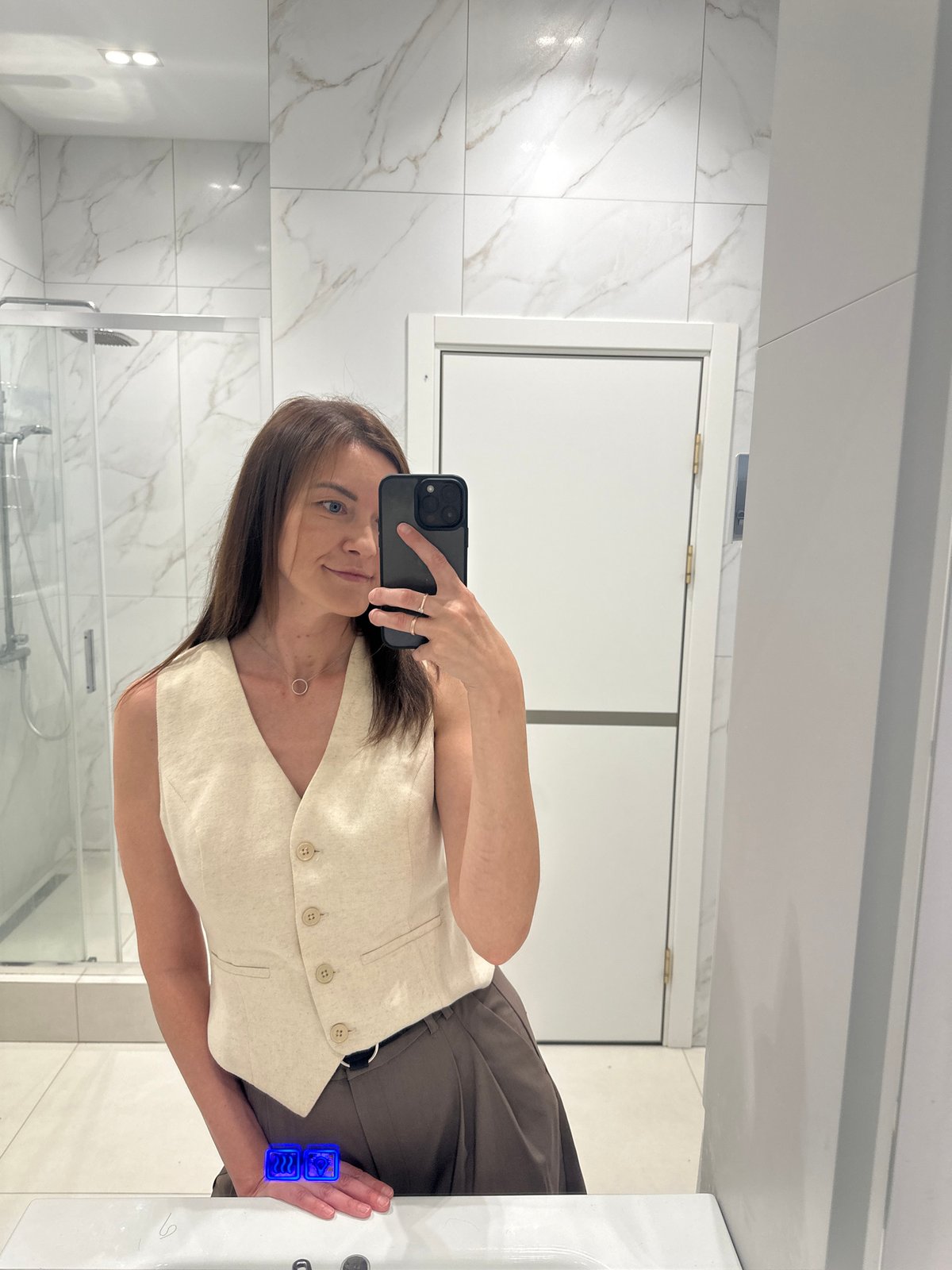 Woman takes bathroom mirror selfies in Прикамский, Russia