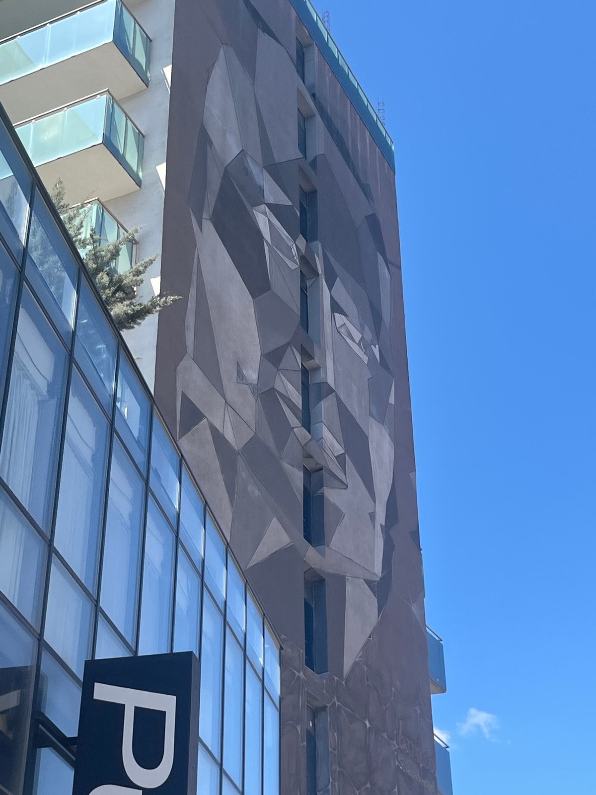 Modern geometric building photographed in Sofia under clear skies