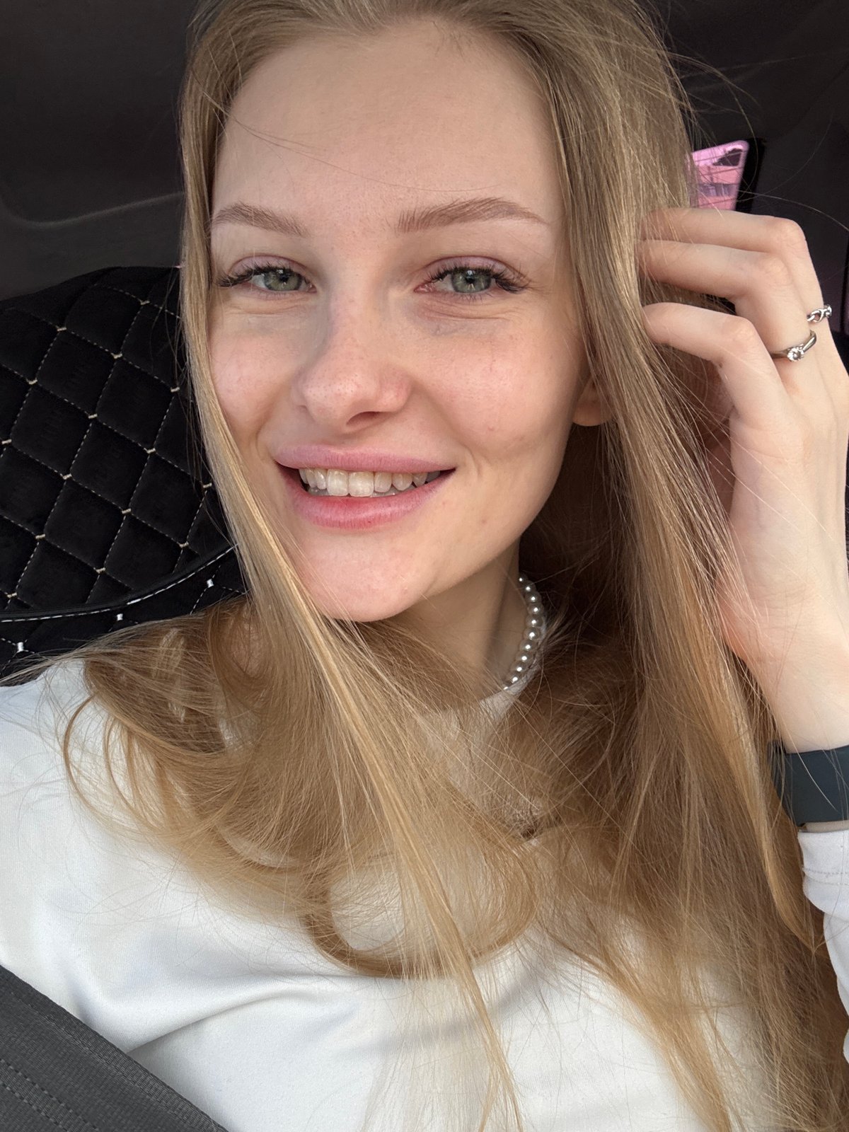 Morning car journey documented through selfies and street scenes in Perm
