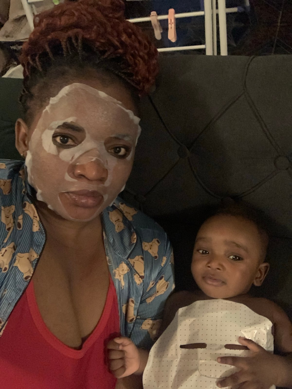 Mother and baby share quiet skincare time in Nigeria