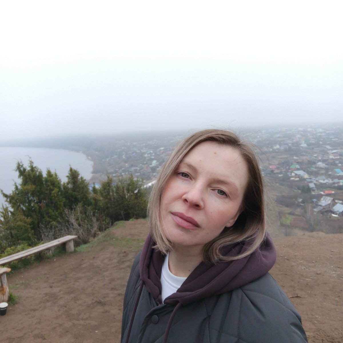 Dense morning fog blankets Ольховка village, Russia