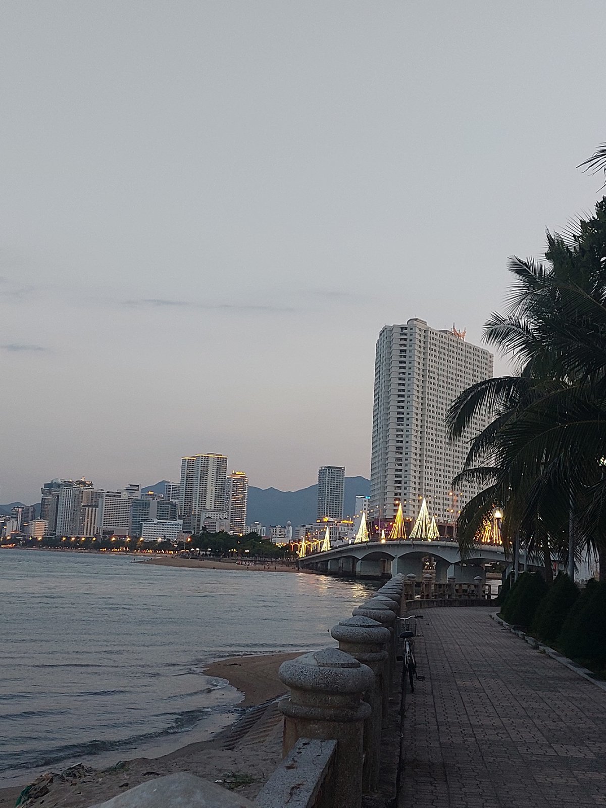 Nha Trang's beachfront promenade: calm scenes, visible pollution