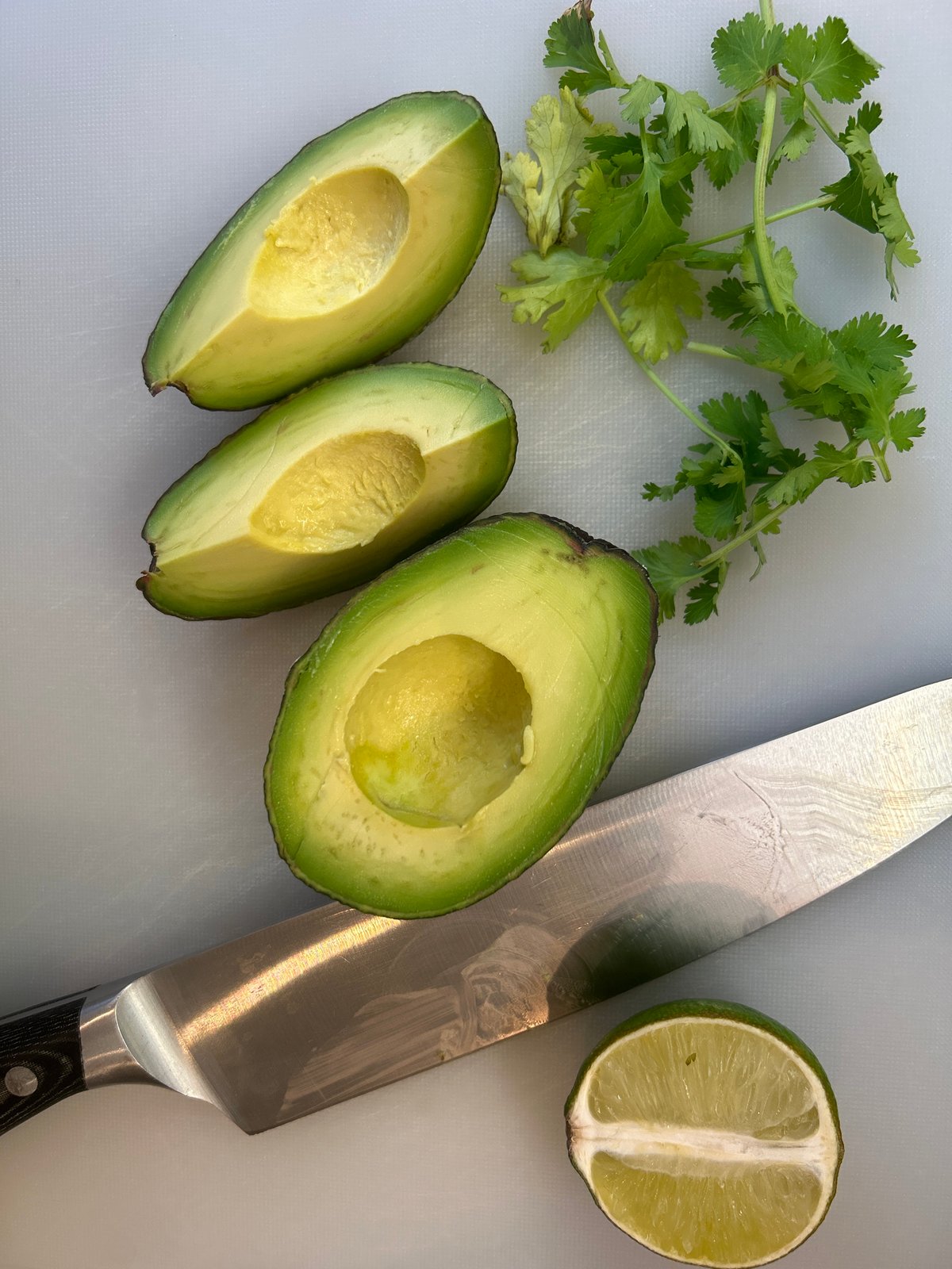 Avocado preparation captured in Manchester kitchen Thursday evening