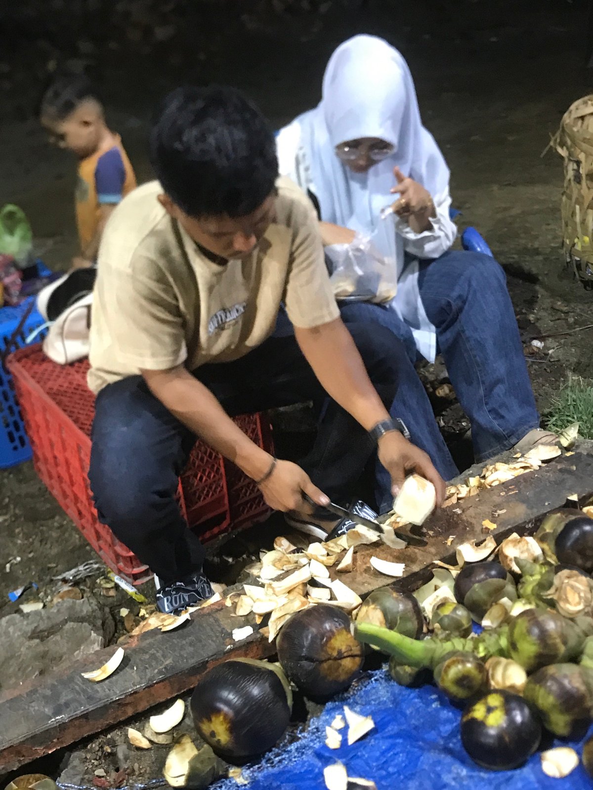 Tropical fruit vendors work busy Banda Aceh market