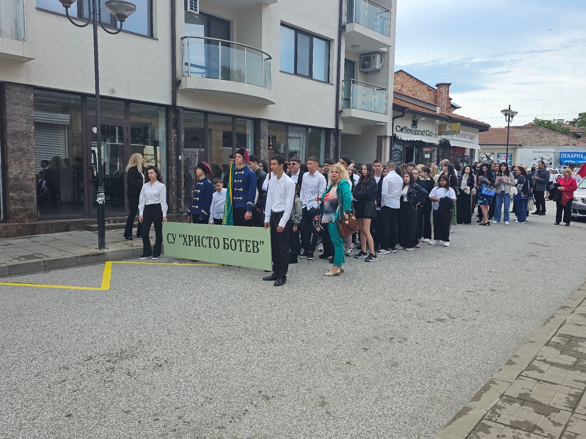 Students march through Karnobat streets in formal procession