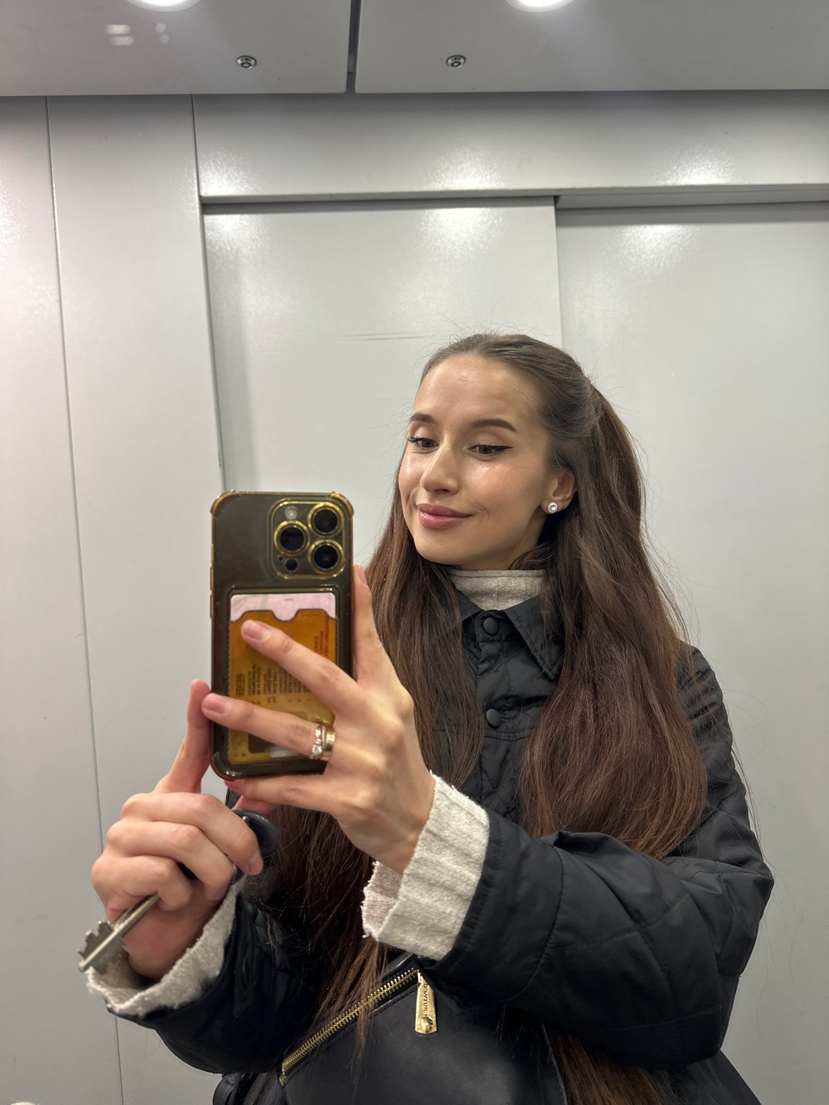 Woman photographed across multiple Yekaterinburg locations during afternoon