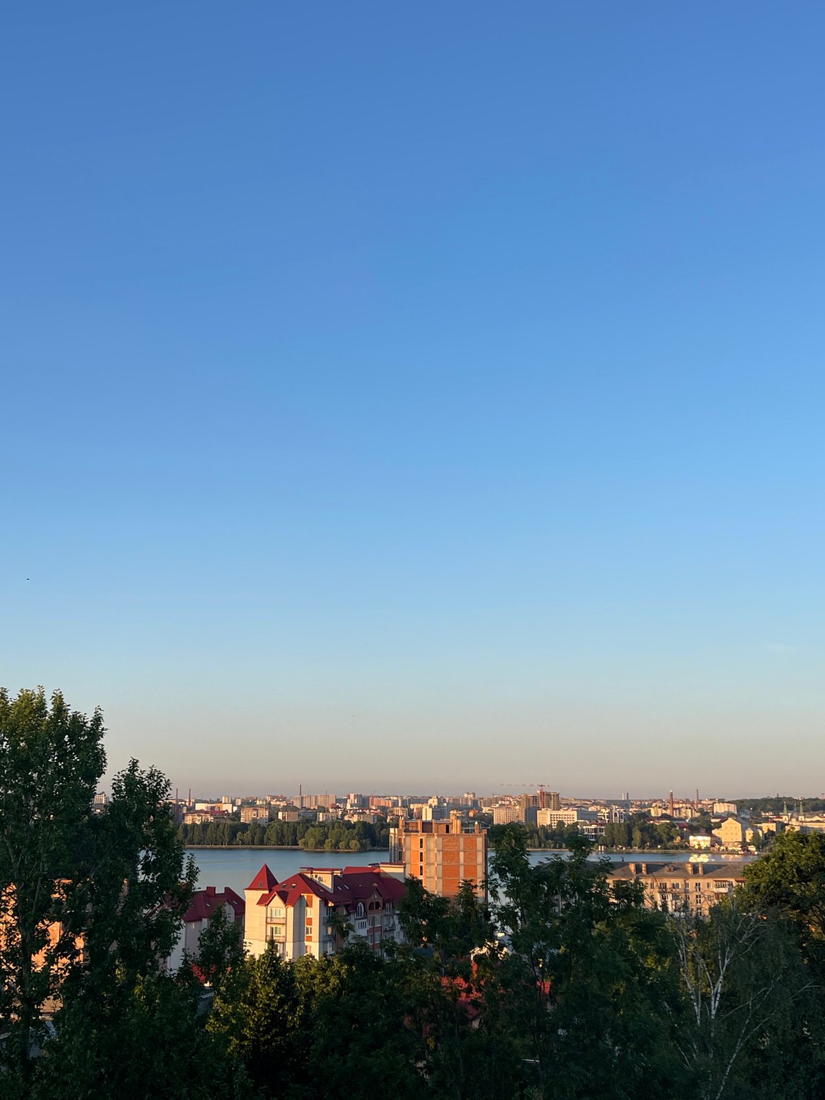 Ternopil skyline stretches across the waterfront from above