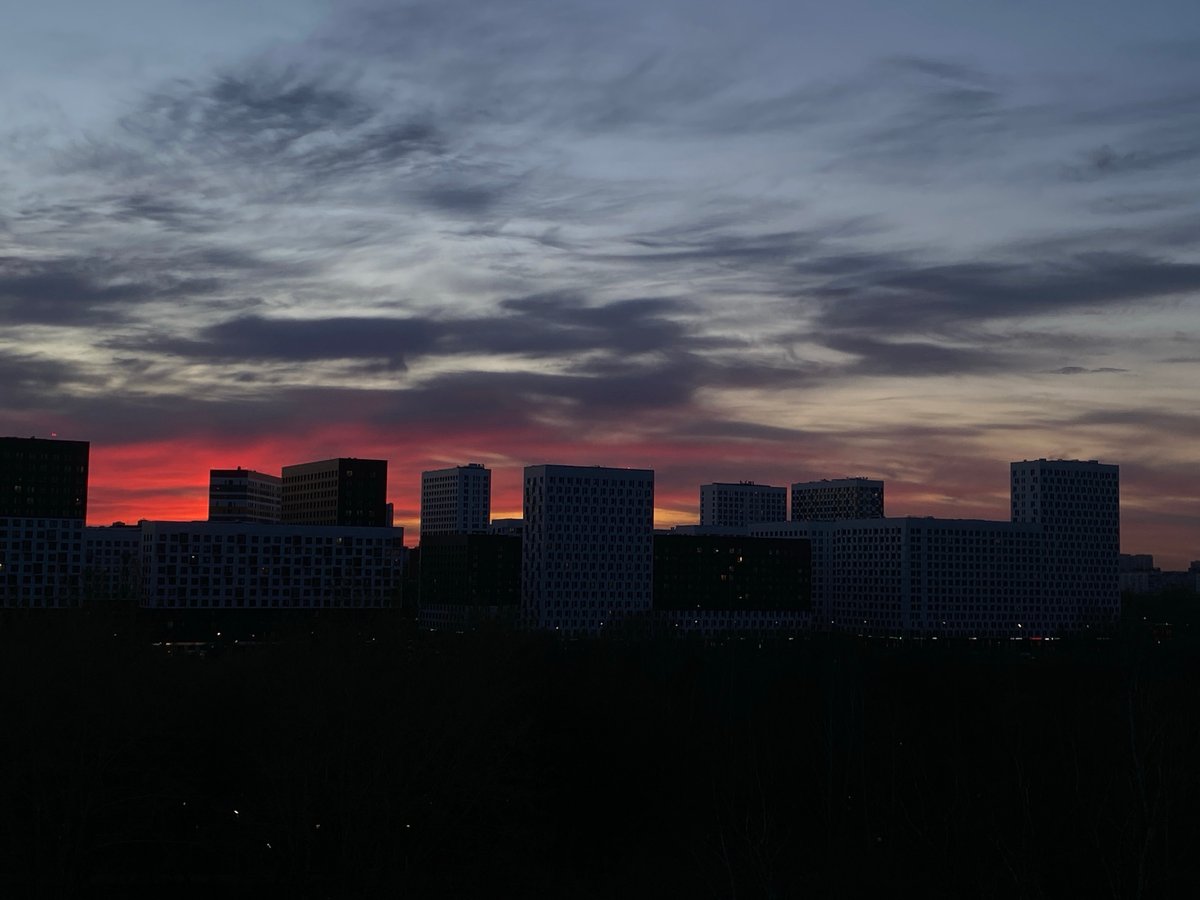 Moscow cityscape captured at dusk with dramatic sky