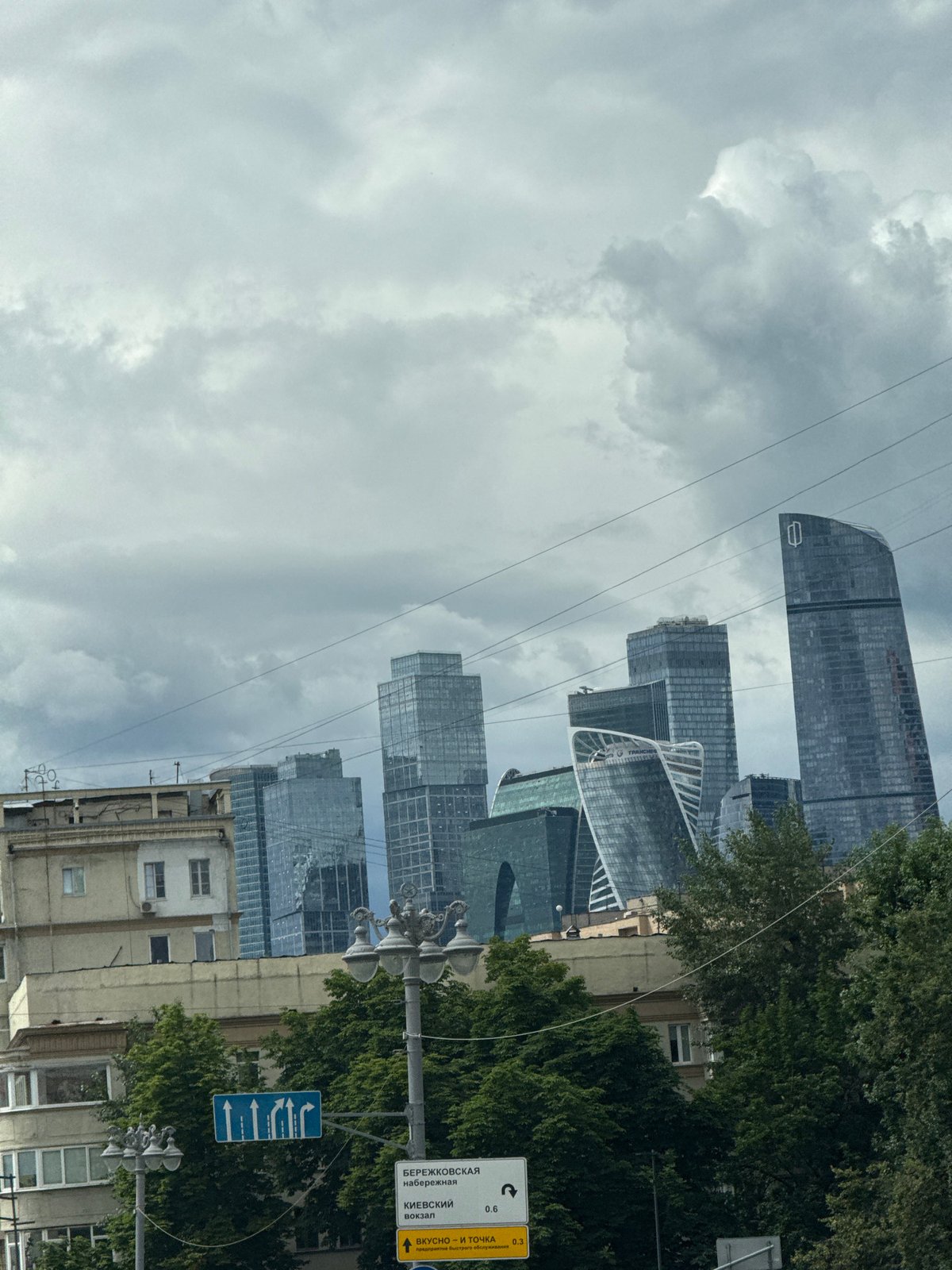 Driving through Moscow past Soviet architecture and modern skyscrapers