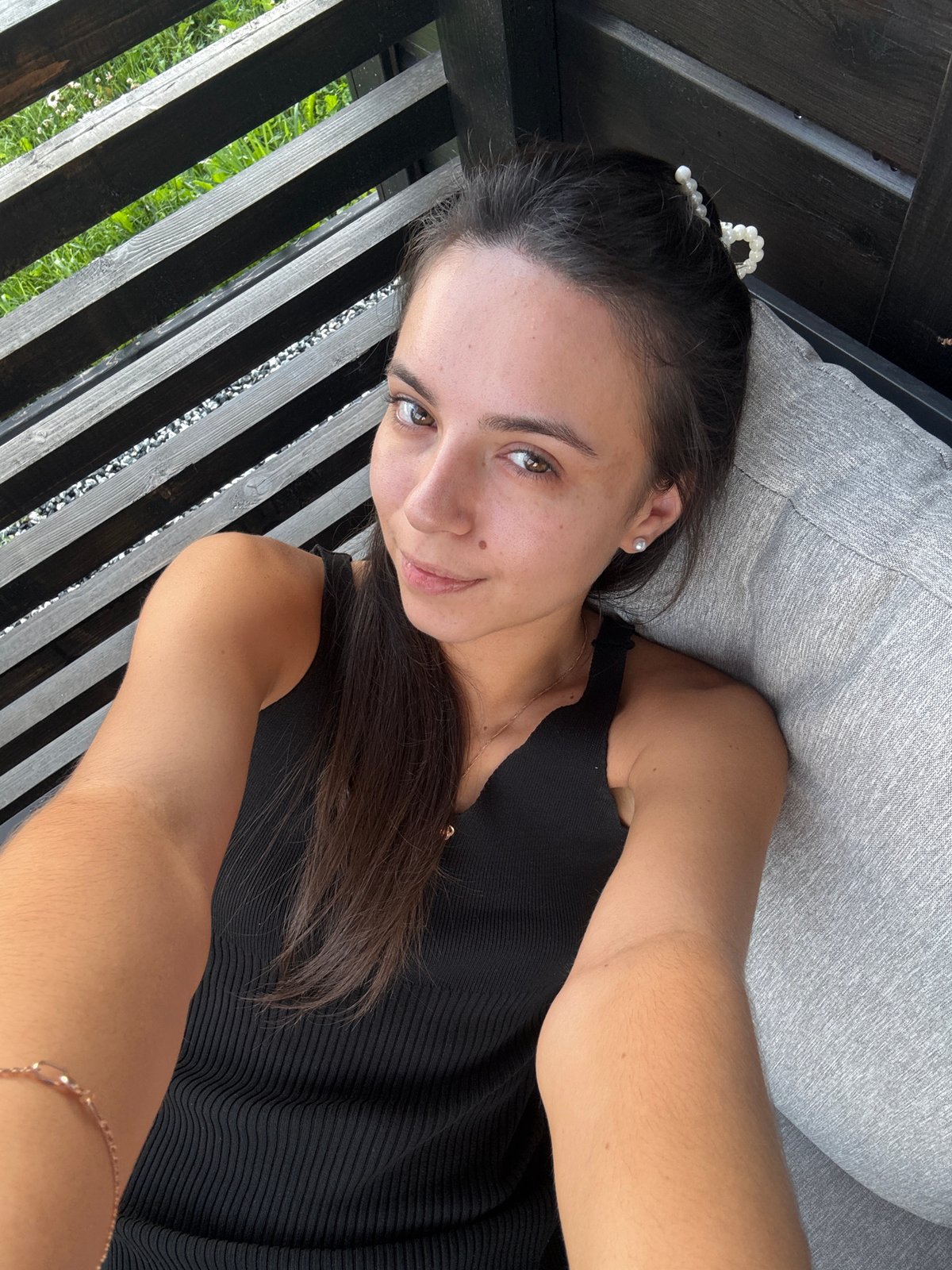 Outdoor drinks and grilled skewers on a balcony