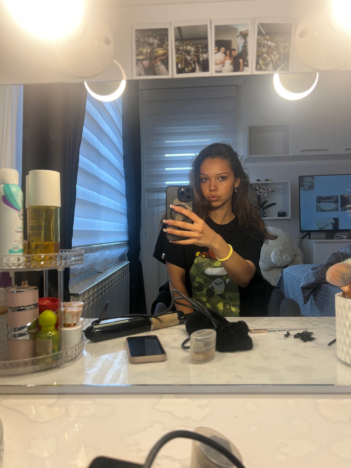 Woman takes bathroom mirror selfies during morning routine