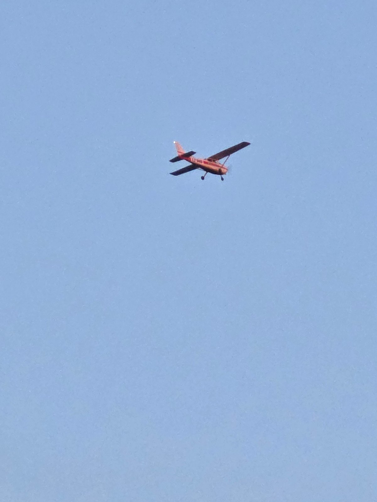 Red biplane and sunset captured in Yagodovo, Bulgaria