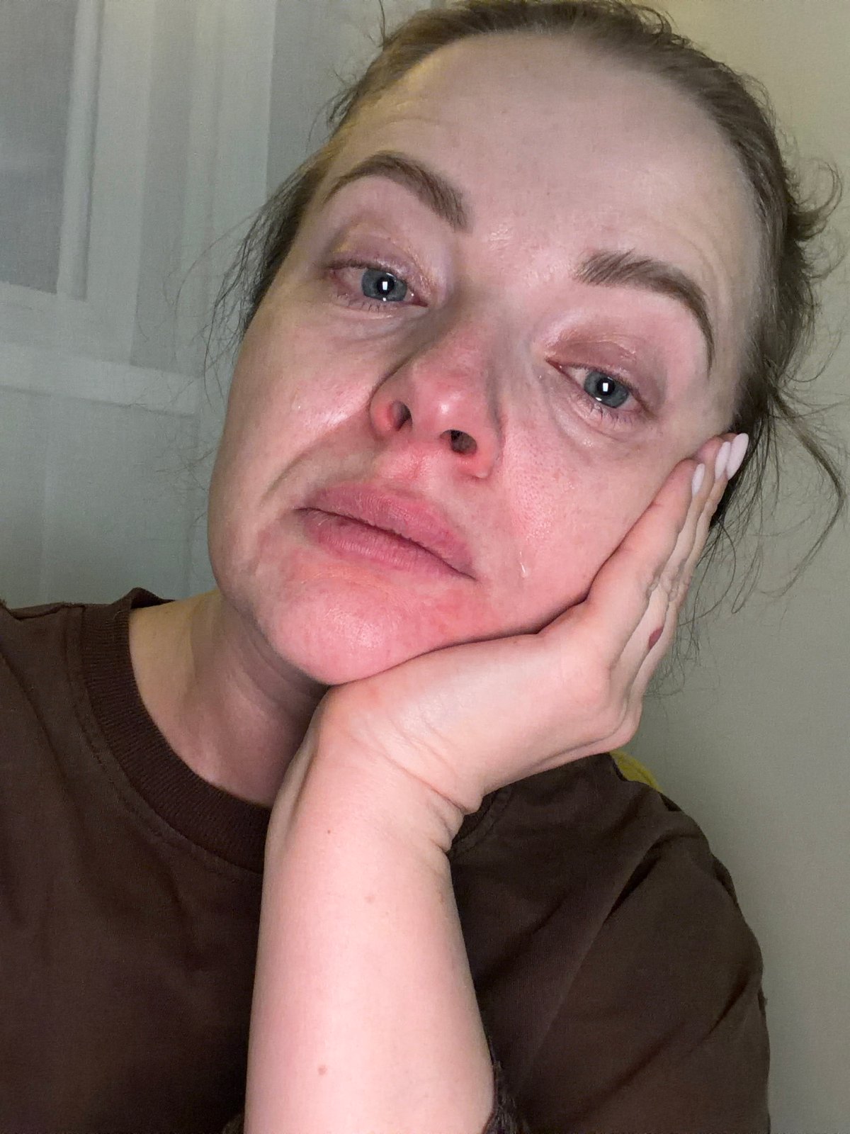 Distressed woman observed crying in Moscow evening