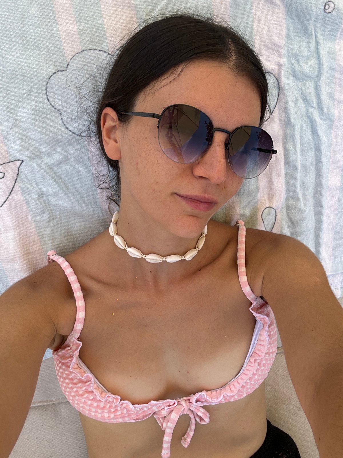 Woman enjoys early morning beach time in Vietnam resort area