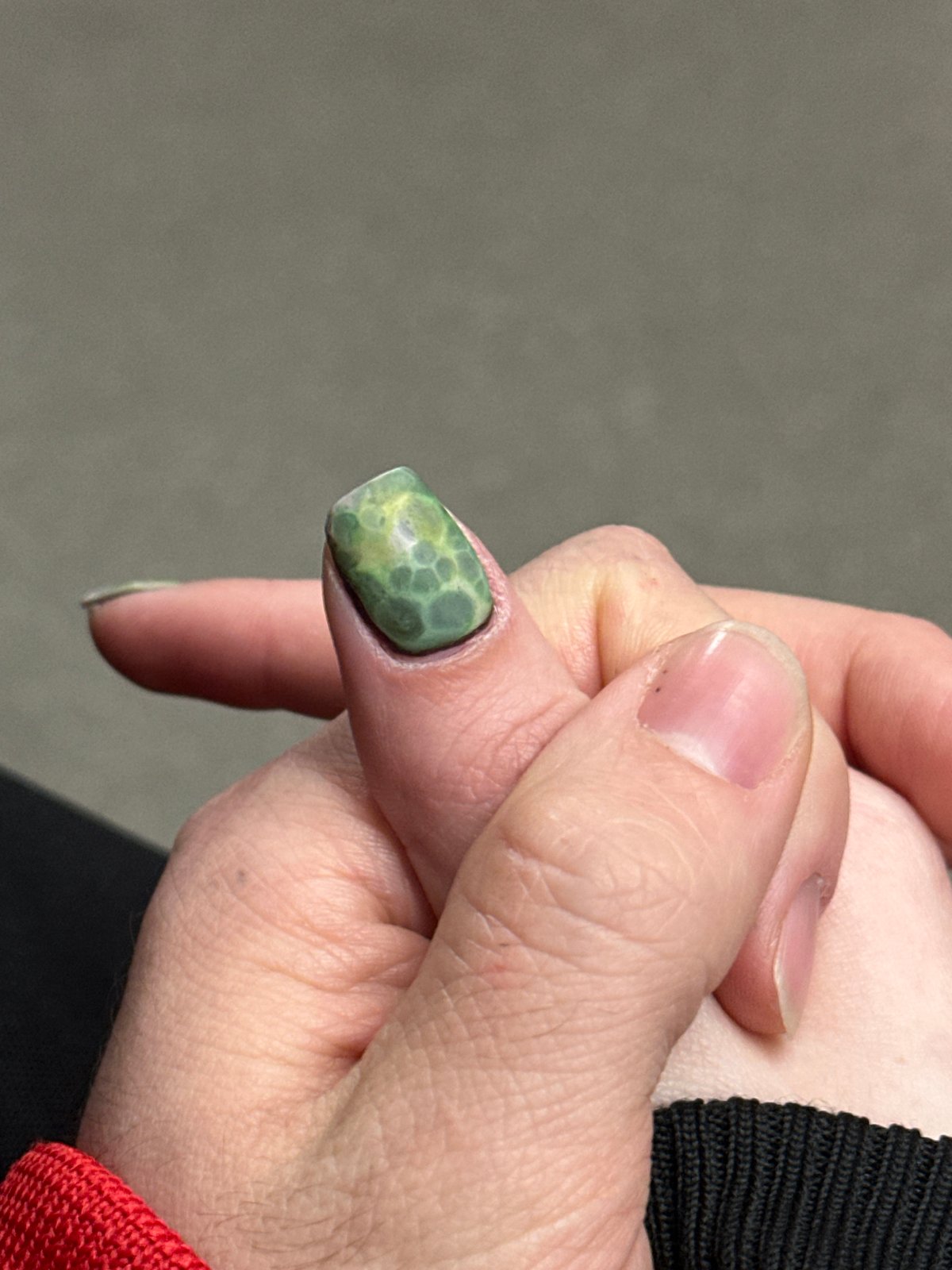 Moscow resident showcases colorful personal style with nail art, bright sneakers