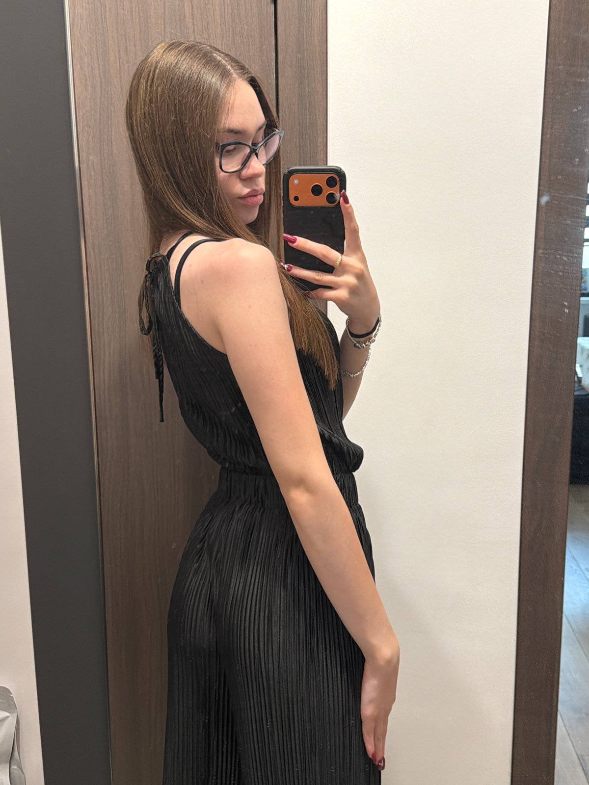Woman takes mirror selfies during photo session in Varna