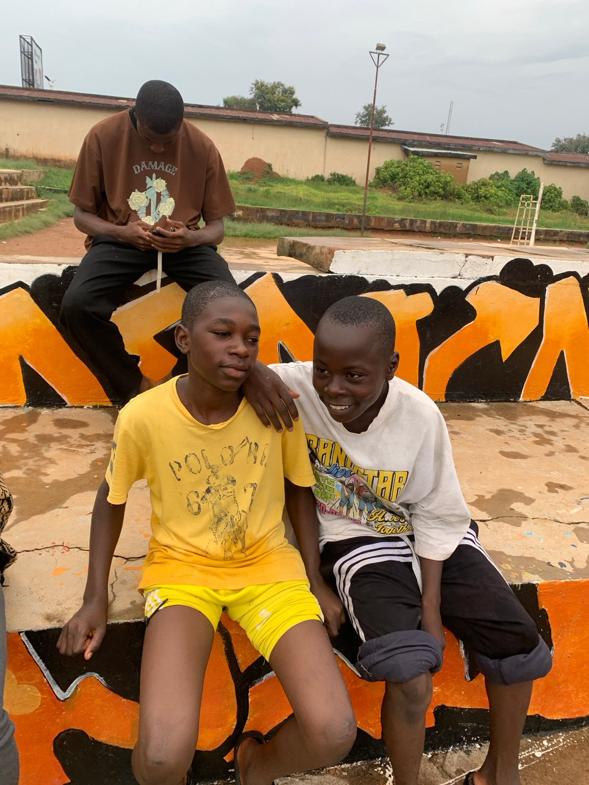 Daily life and conversations in Jos, Nigeria during rainy weather