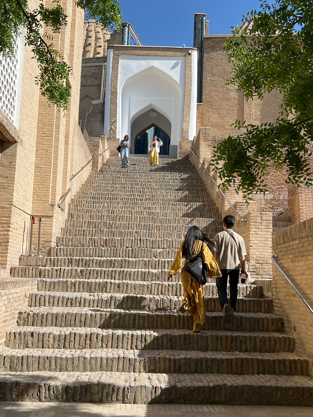 Exploring Shah-i-Zinda's tiled mausoleums and staircases in Samarkand