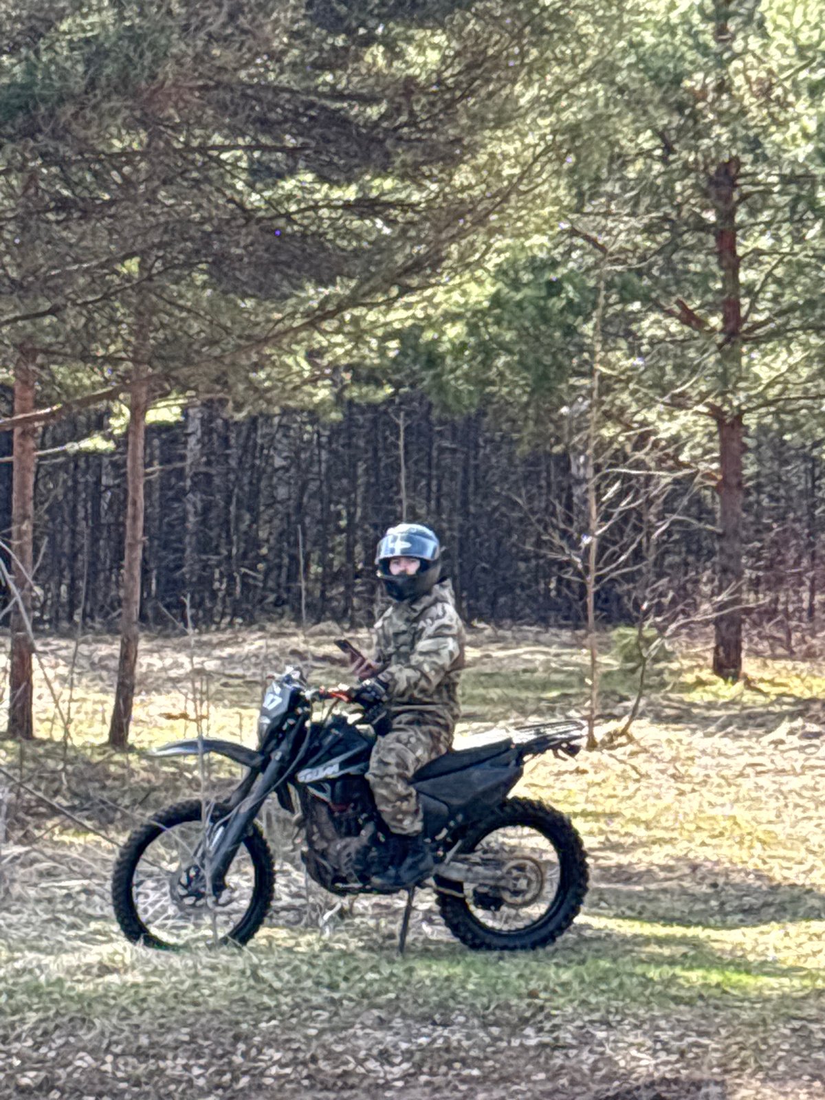 Morning scenes: dirt biker, chickens documented in Noviy, Russia