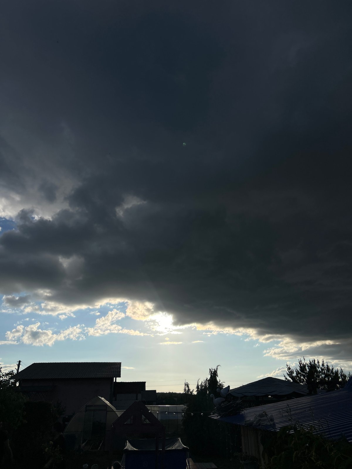 Storm clouds with dramatic sunlight captured in Ольховка, Russia
