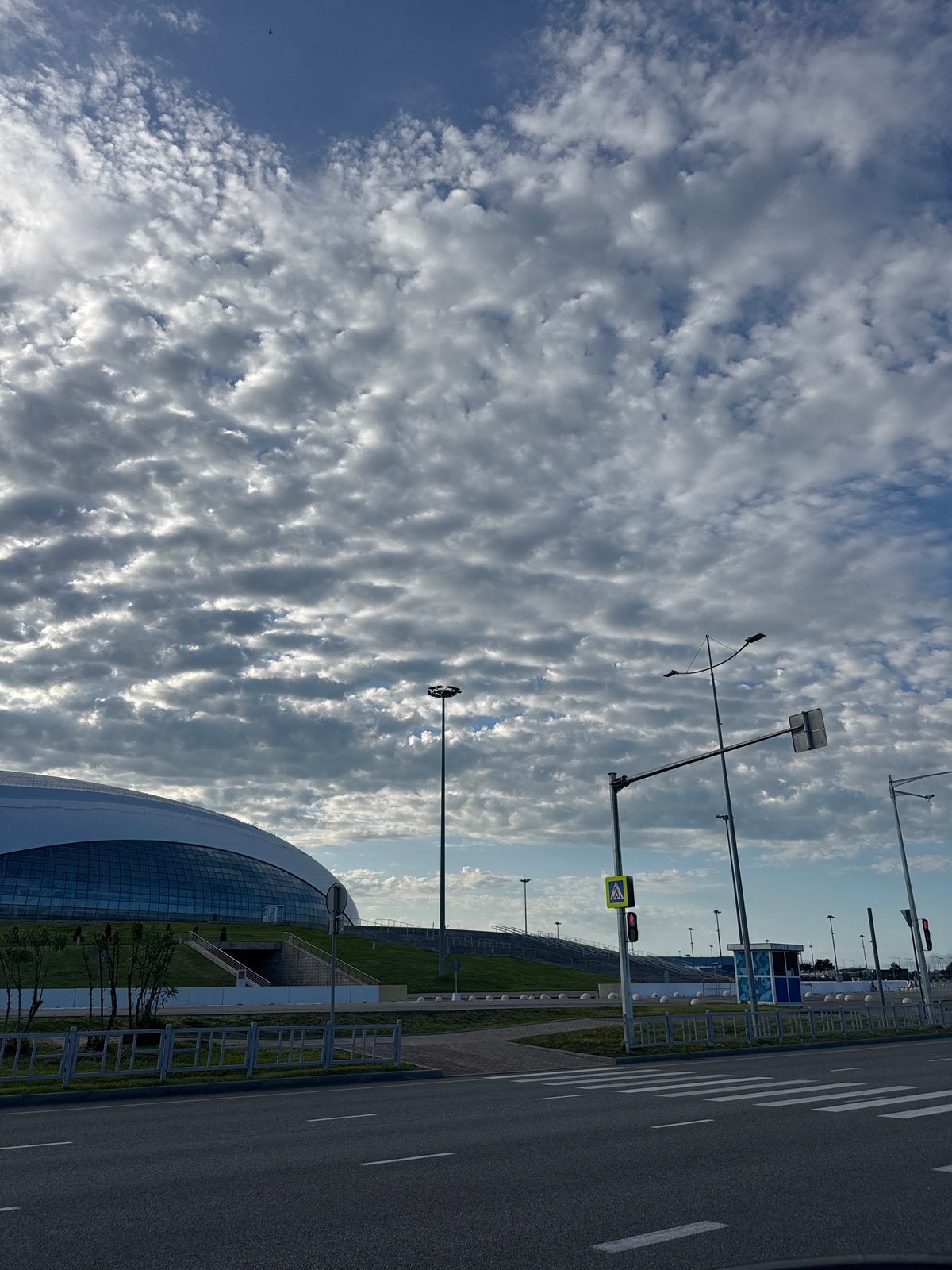 Modern architecture observed under striking clouds in Sirius, Russia