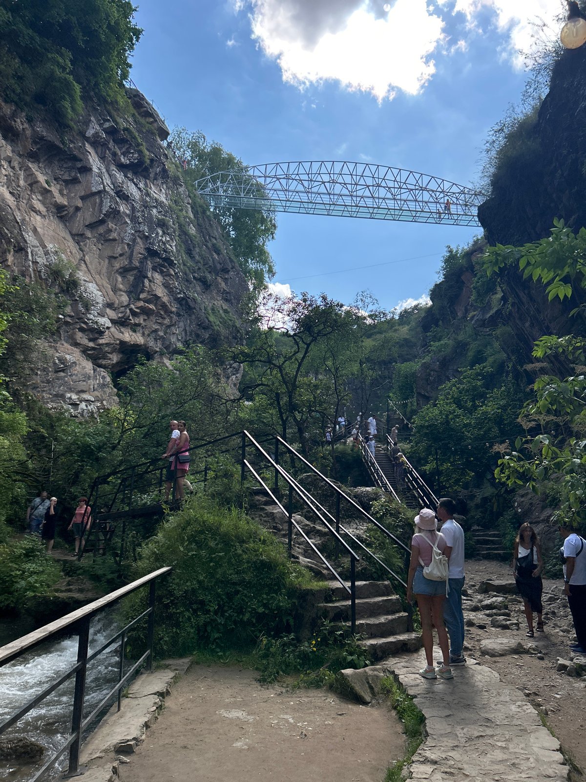 Glass bridge and waterfall gorge at Krasny Kurgan, Russia