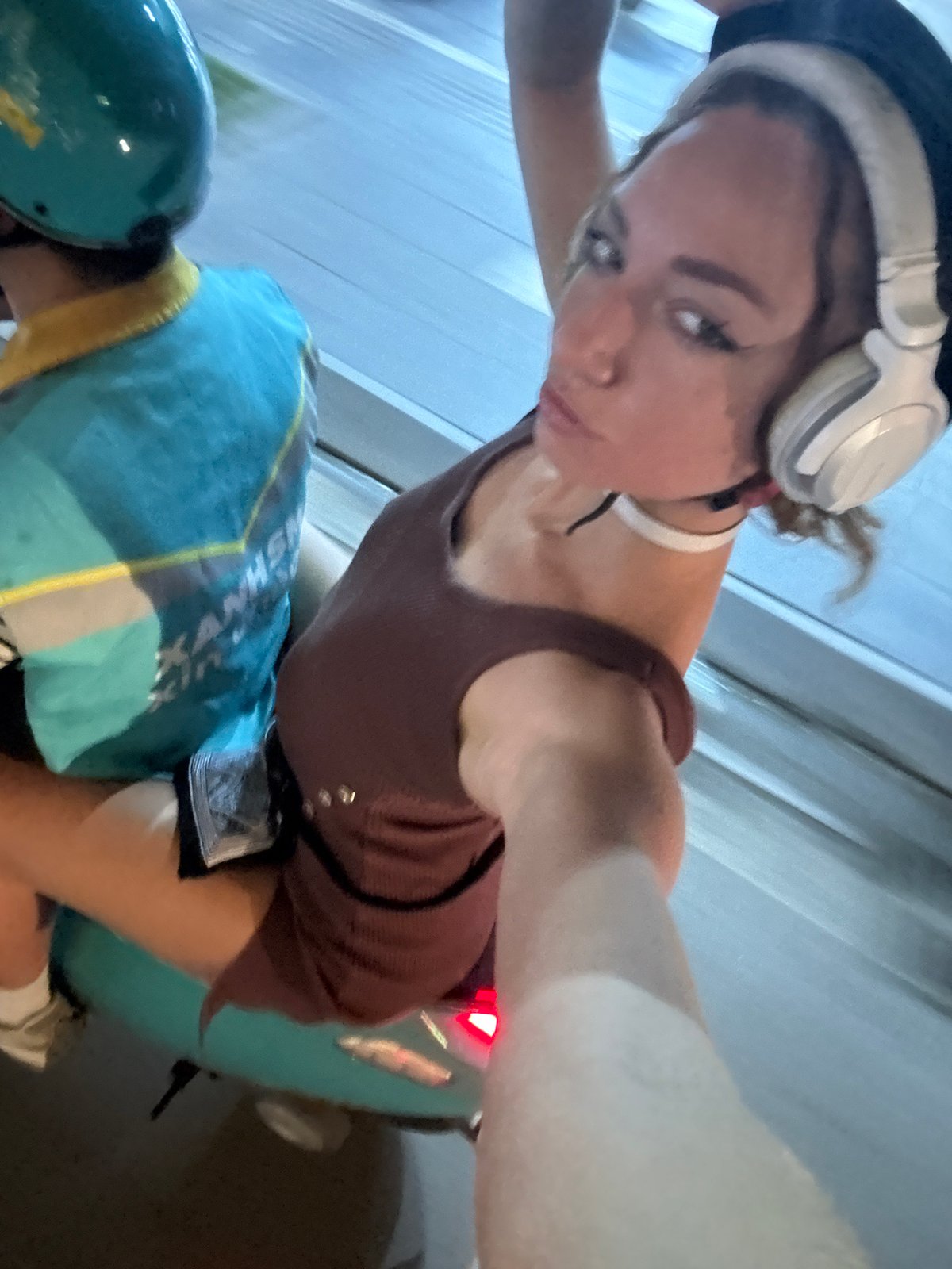 Scooter selfie on a turquoise ride through Hà Nội