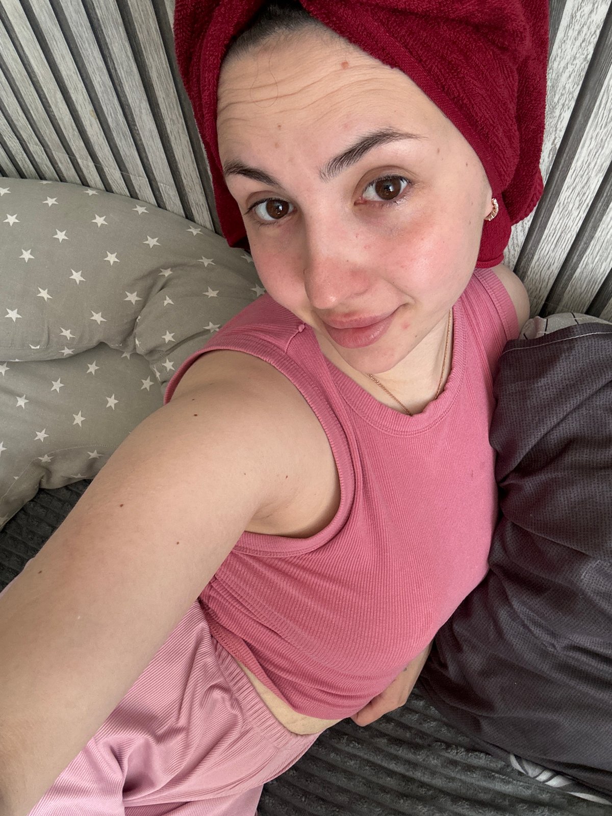 Woman rests with towel-wrapped head in Марковский room