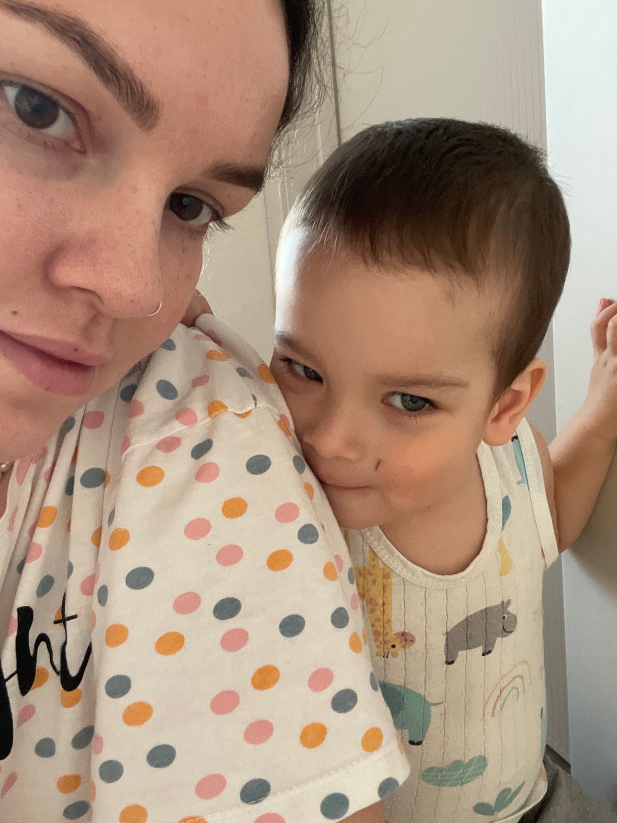 Family plays doctor with toy medical kit at home