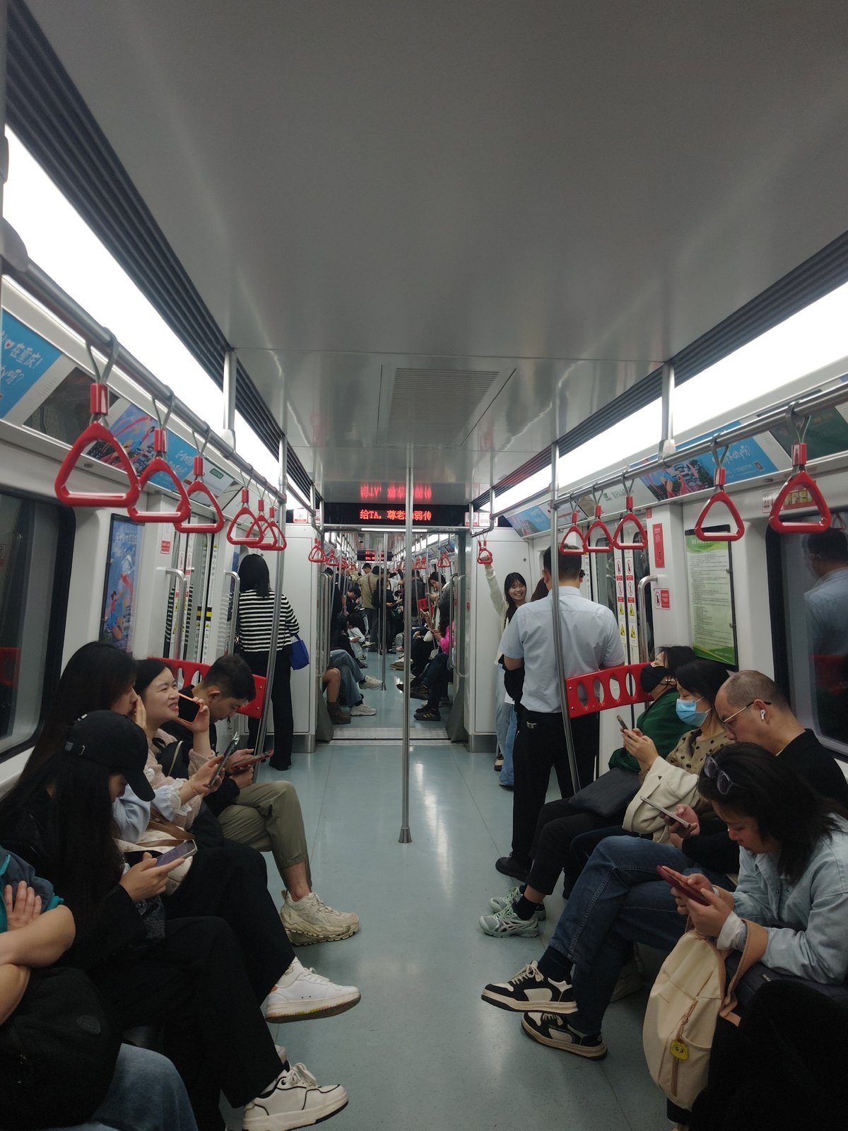 Morning subway commute captured with typical passenger activity