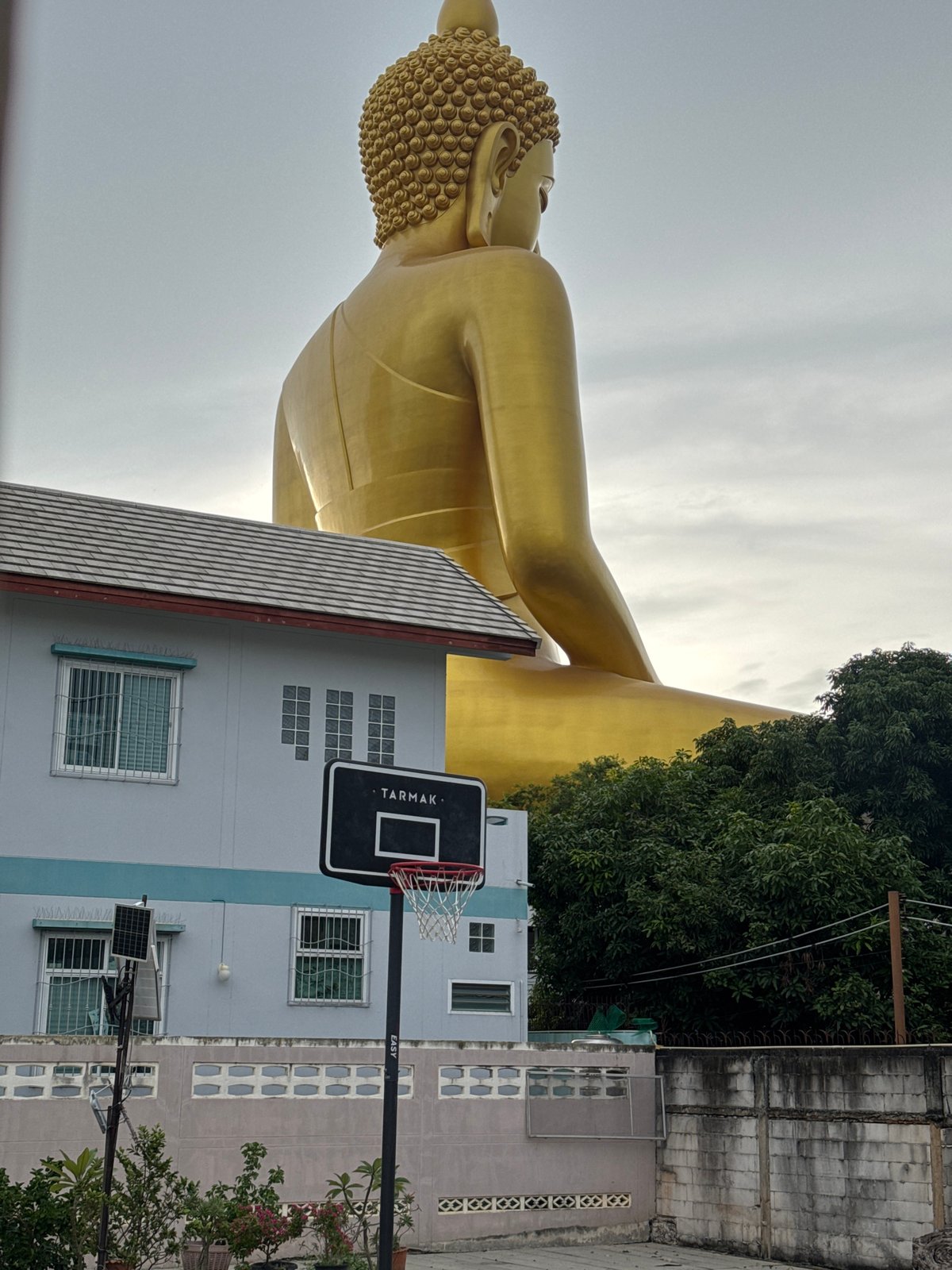 Colossal golden Buddha statue looms over Bangkok skyline