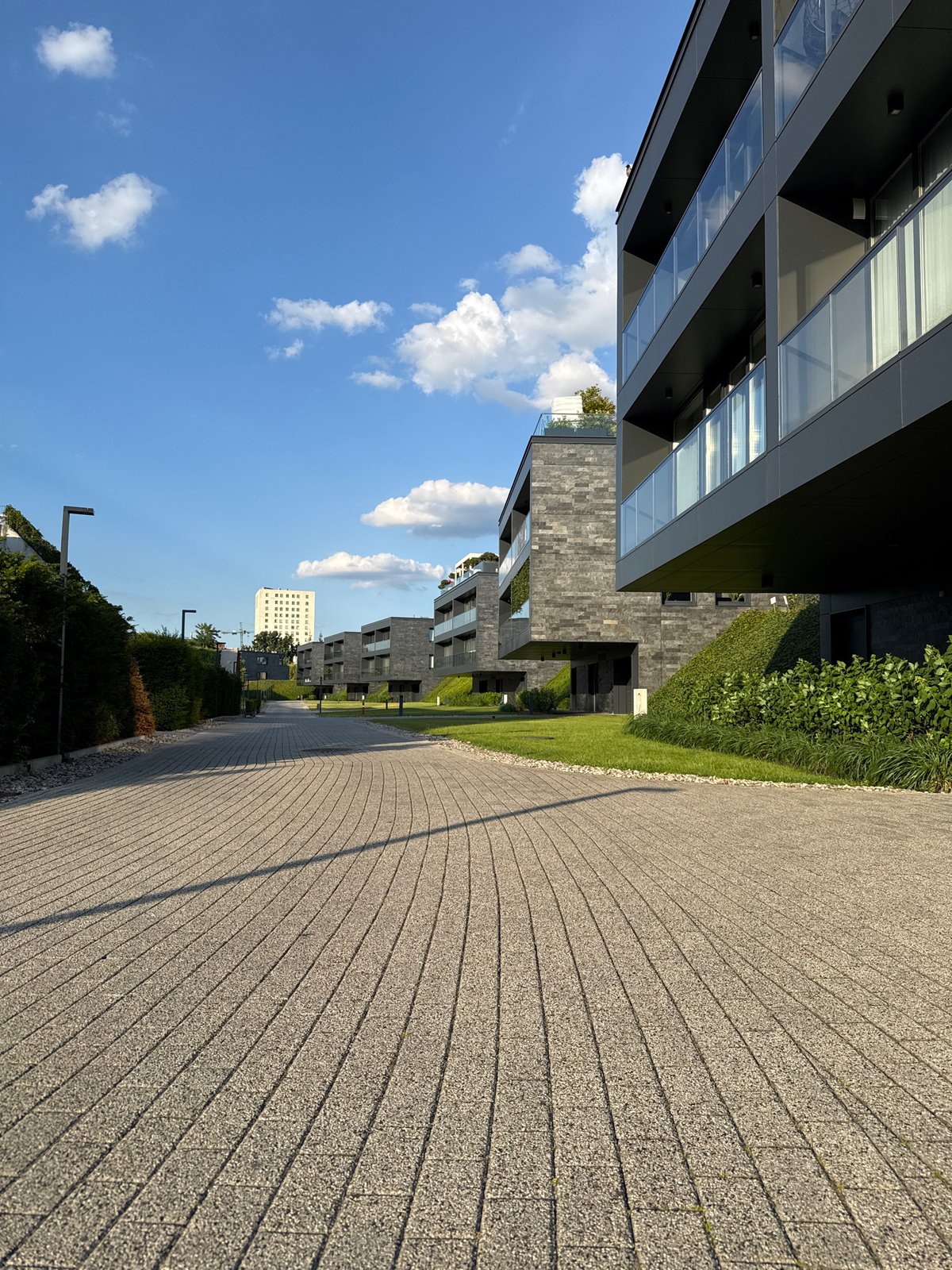 Modern Warsaw architecture and streetside details on a summer afternoon