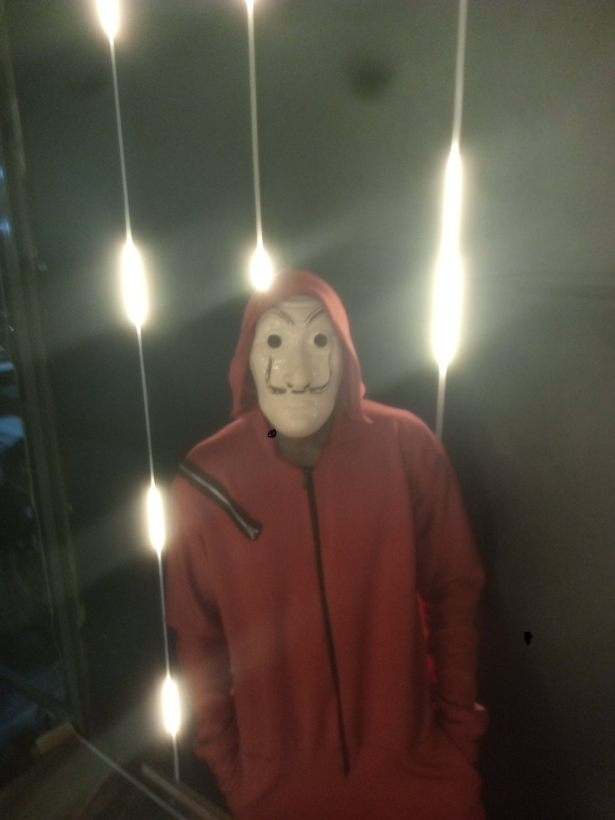 Person in Dali mask, red jumpsuit spotted in Gwarinpa