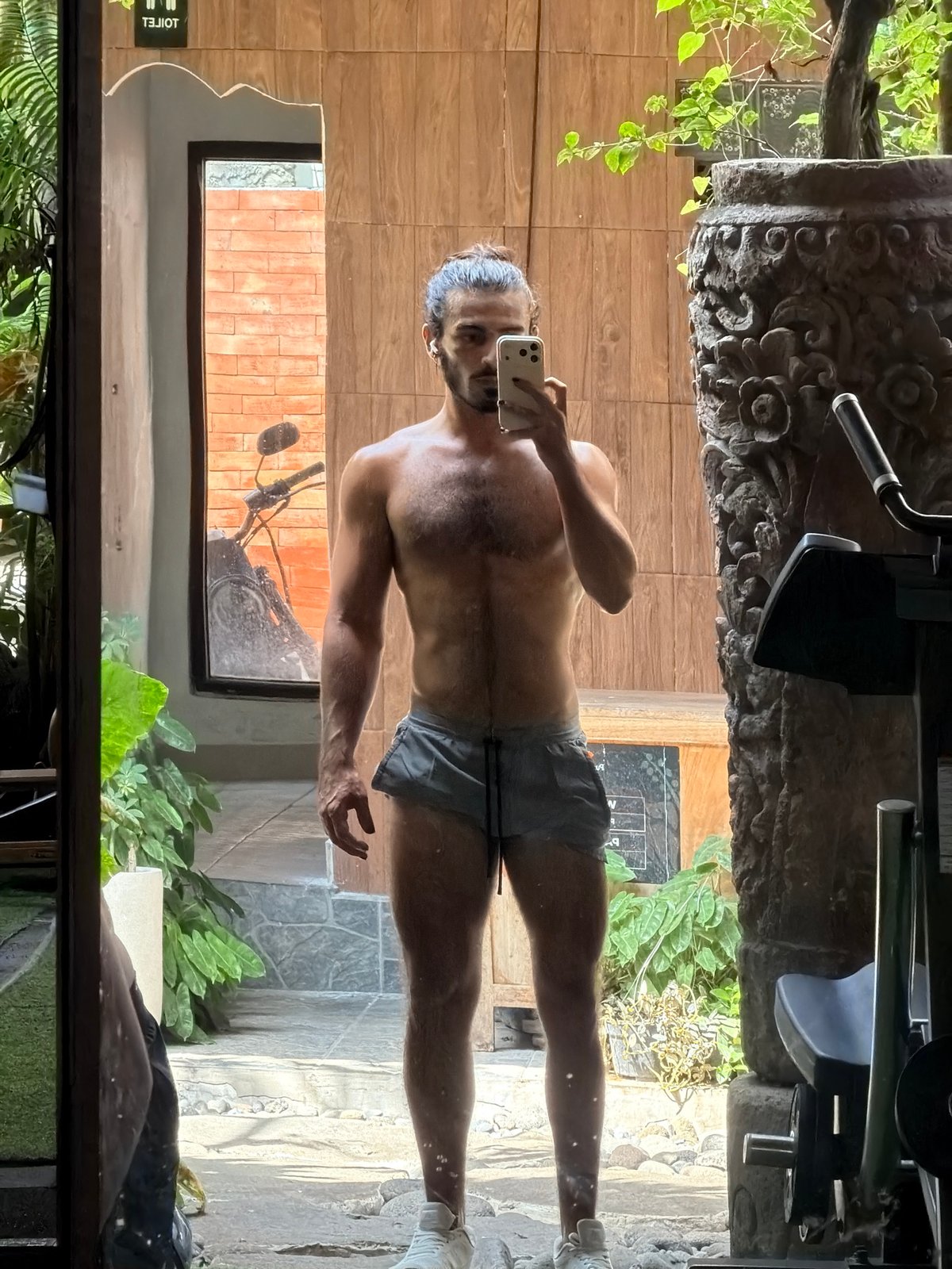 Gym workout in Bali, with a poodle in sunglasses
