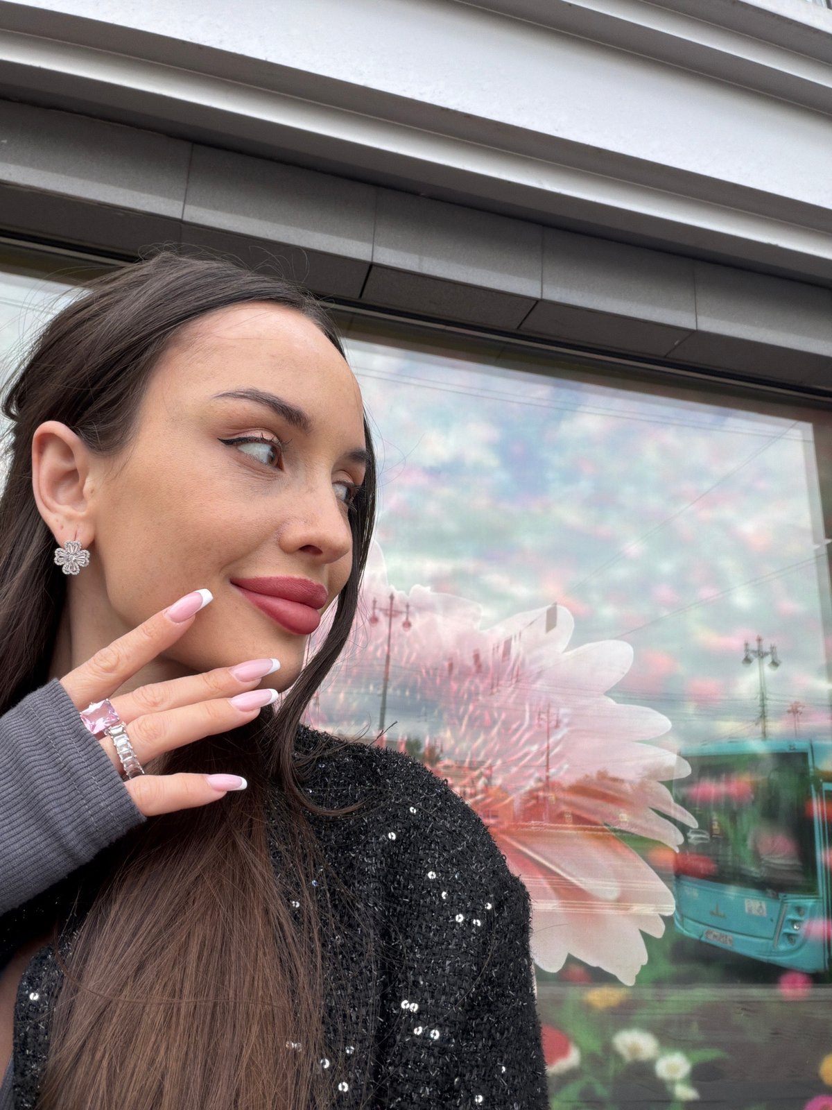 Woman photographed near Moskovsky Gate during midday Saint Petersburg session