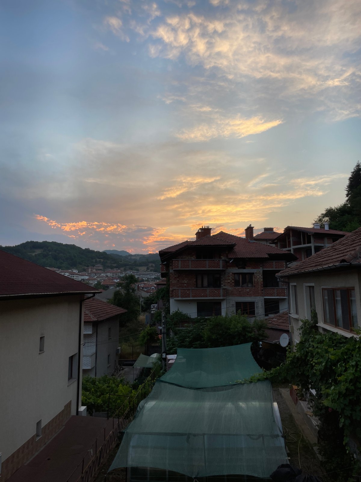 Sunset over Zlatograd rooftops, Bulgaria