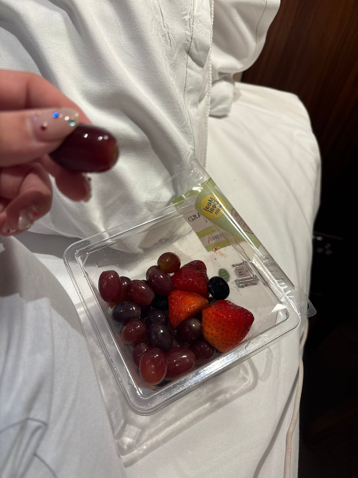 London resident enjoys mixed fruit snack in bed Friday evening