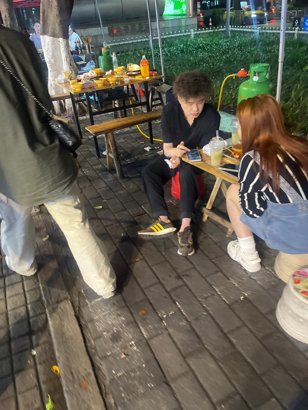 Evening urban life documented across Yuzhong District dining, transit areas