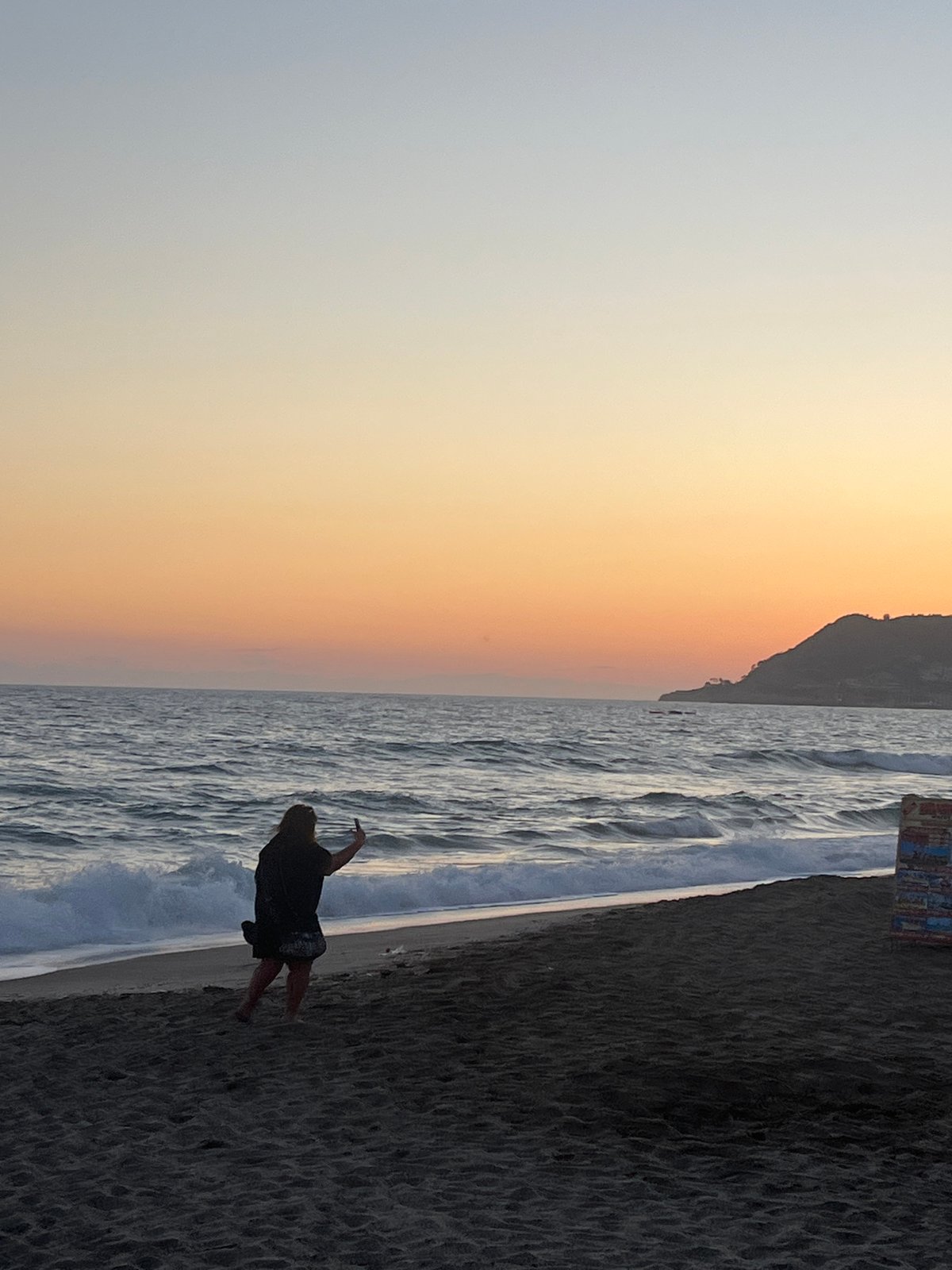 Sunset beach walk captured in Alanya, Turkey
