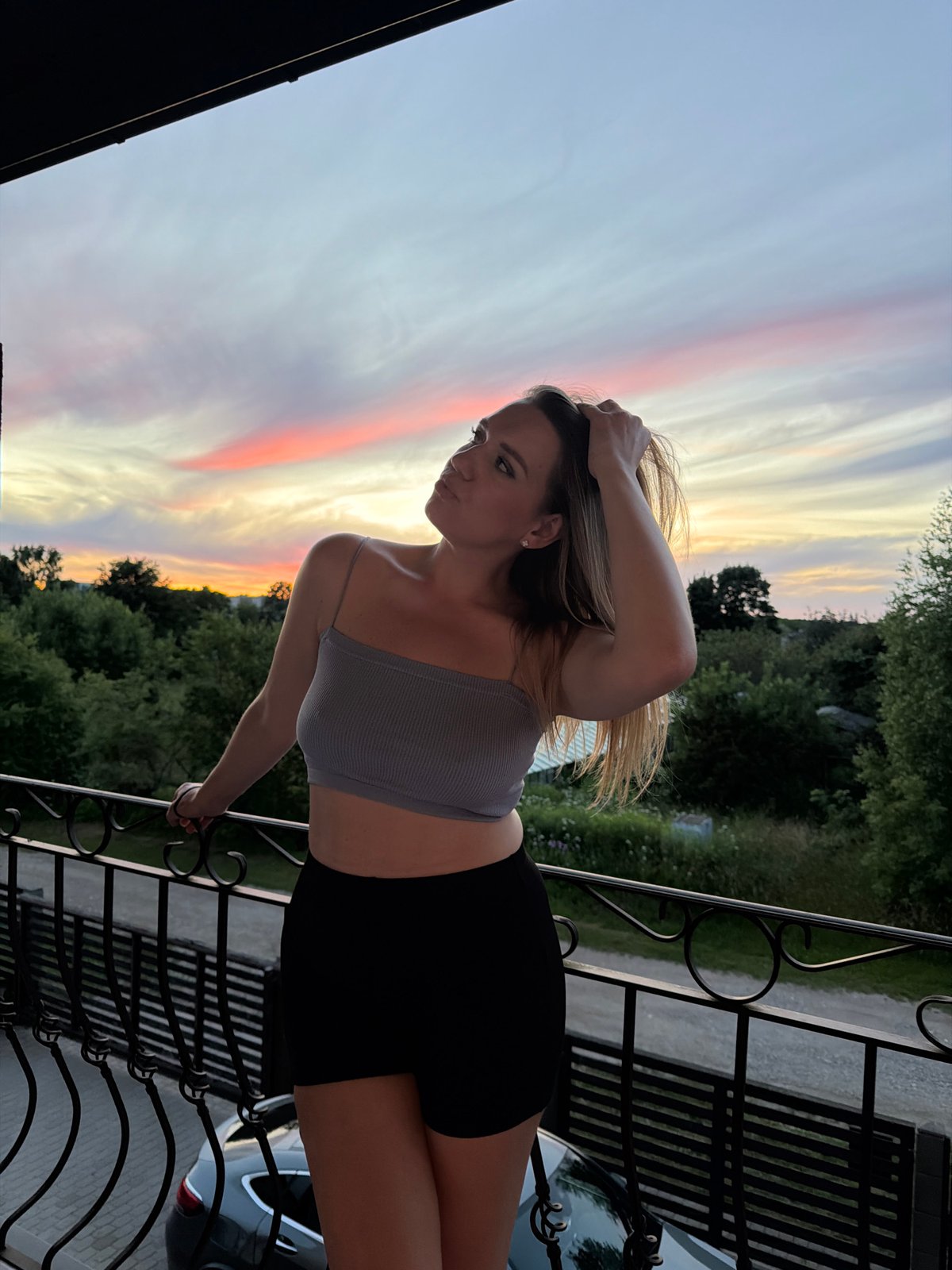 Balcony sunset poses and skies over Dreiliņi, Latvia