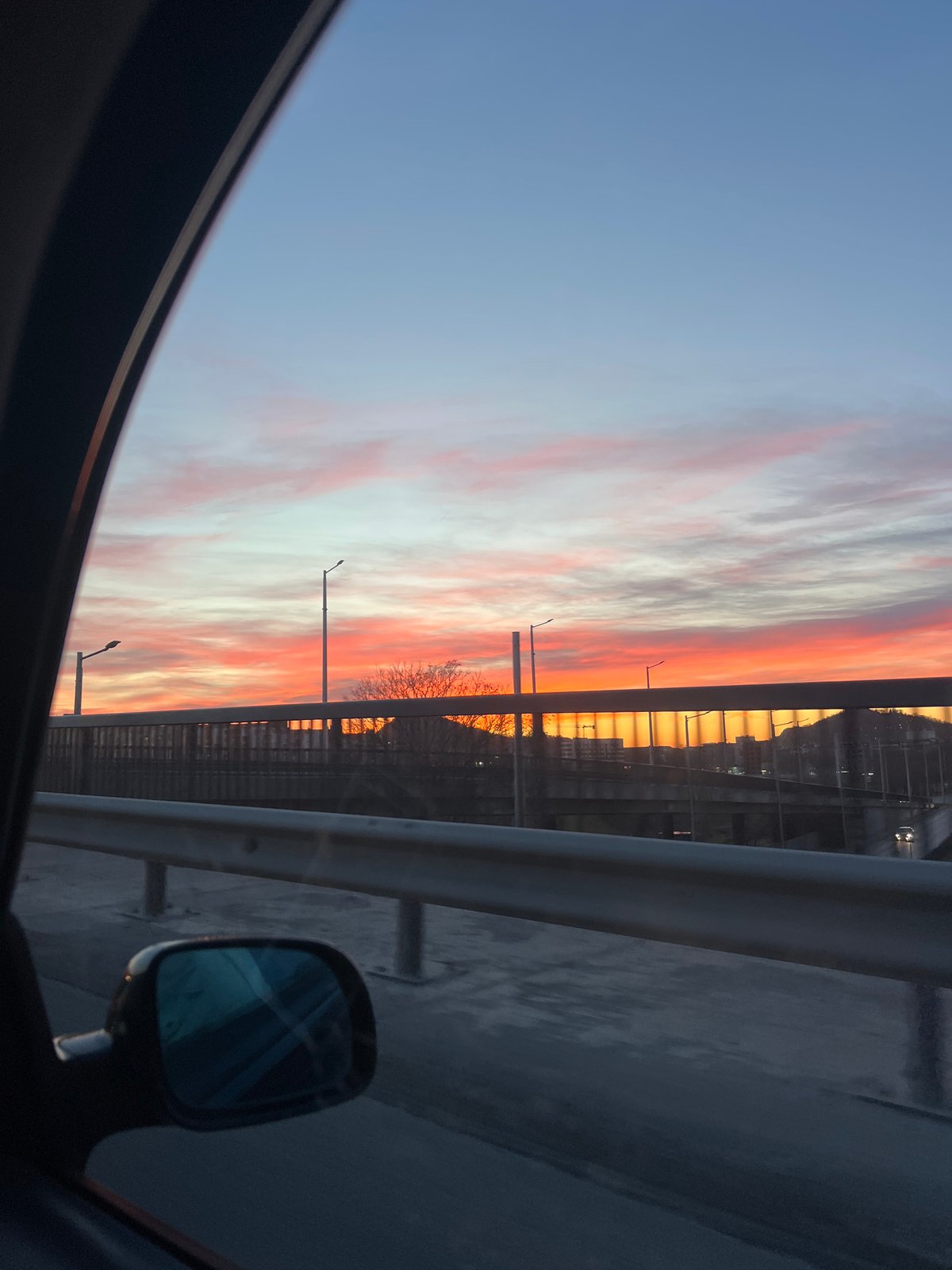 Evening sunset captured from car on Plovdiv bridge