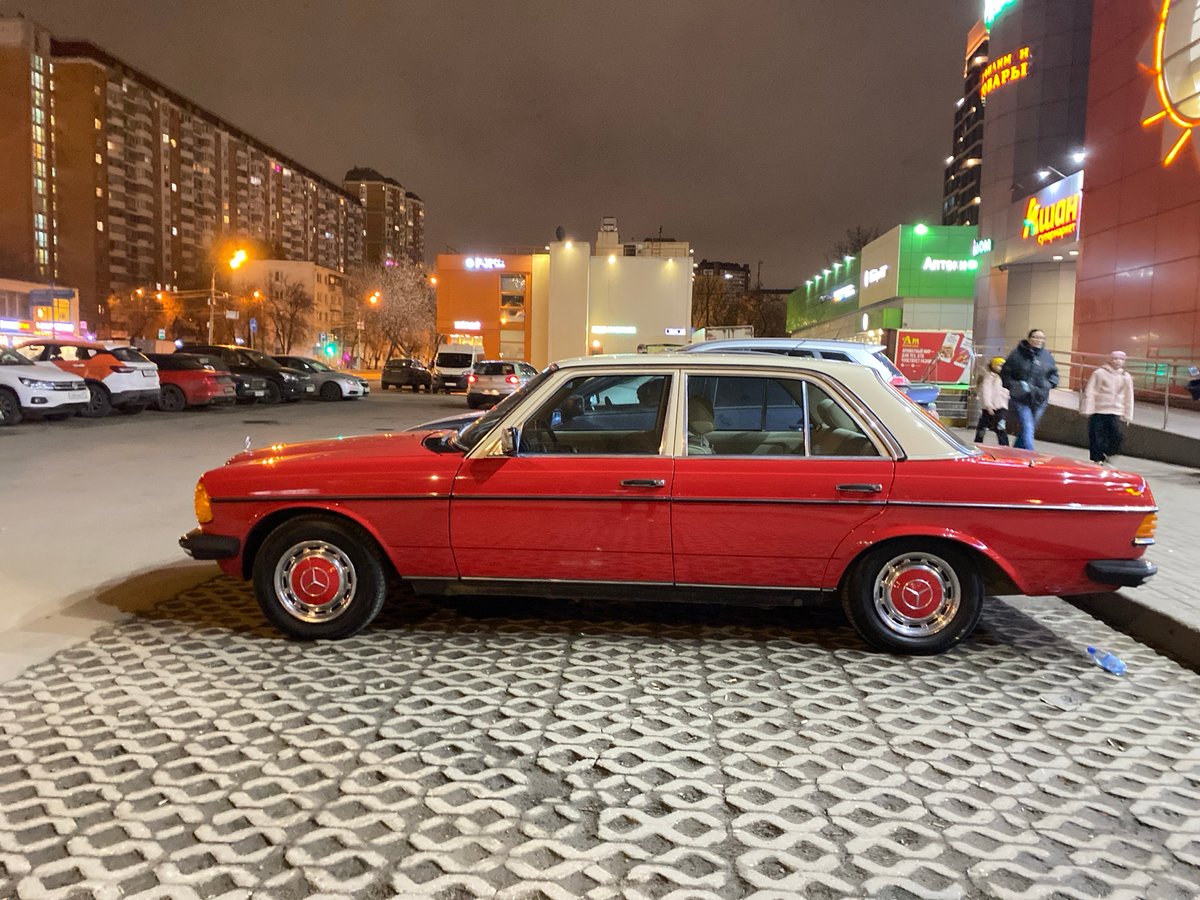 Vintage Mercedes spotted parked on Moscow sidewalk at night