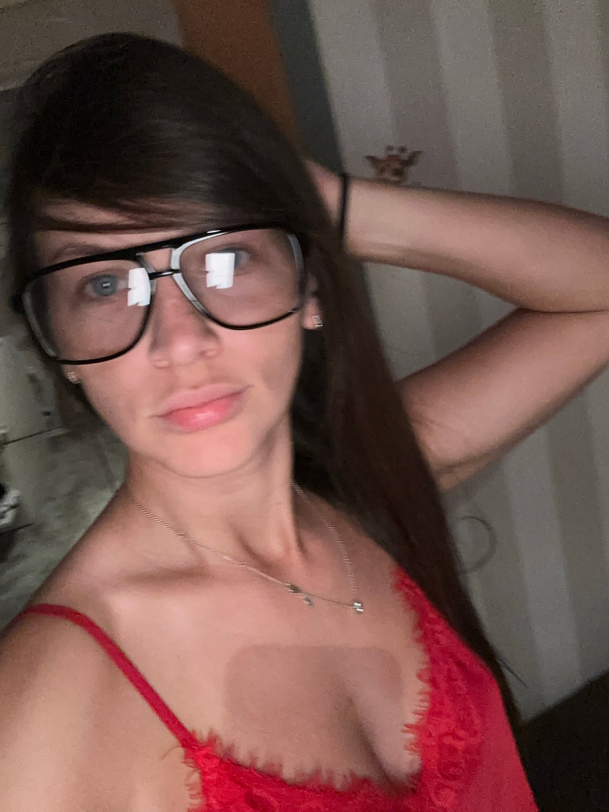 Woman takes multiple selfies at home in Fredenbeck