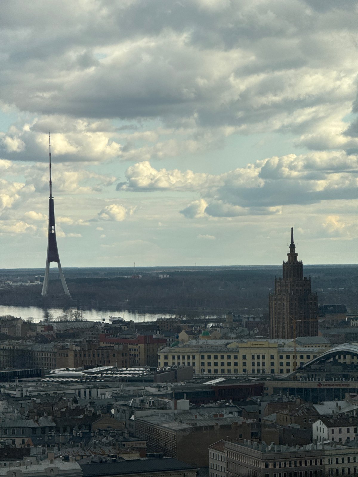 Aerial view captures Riga skyline with radio tower landmark