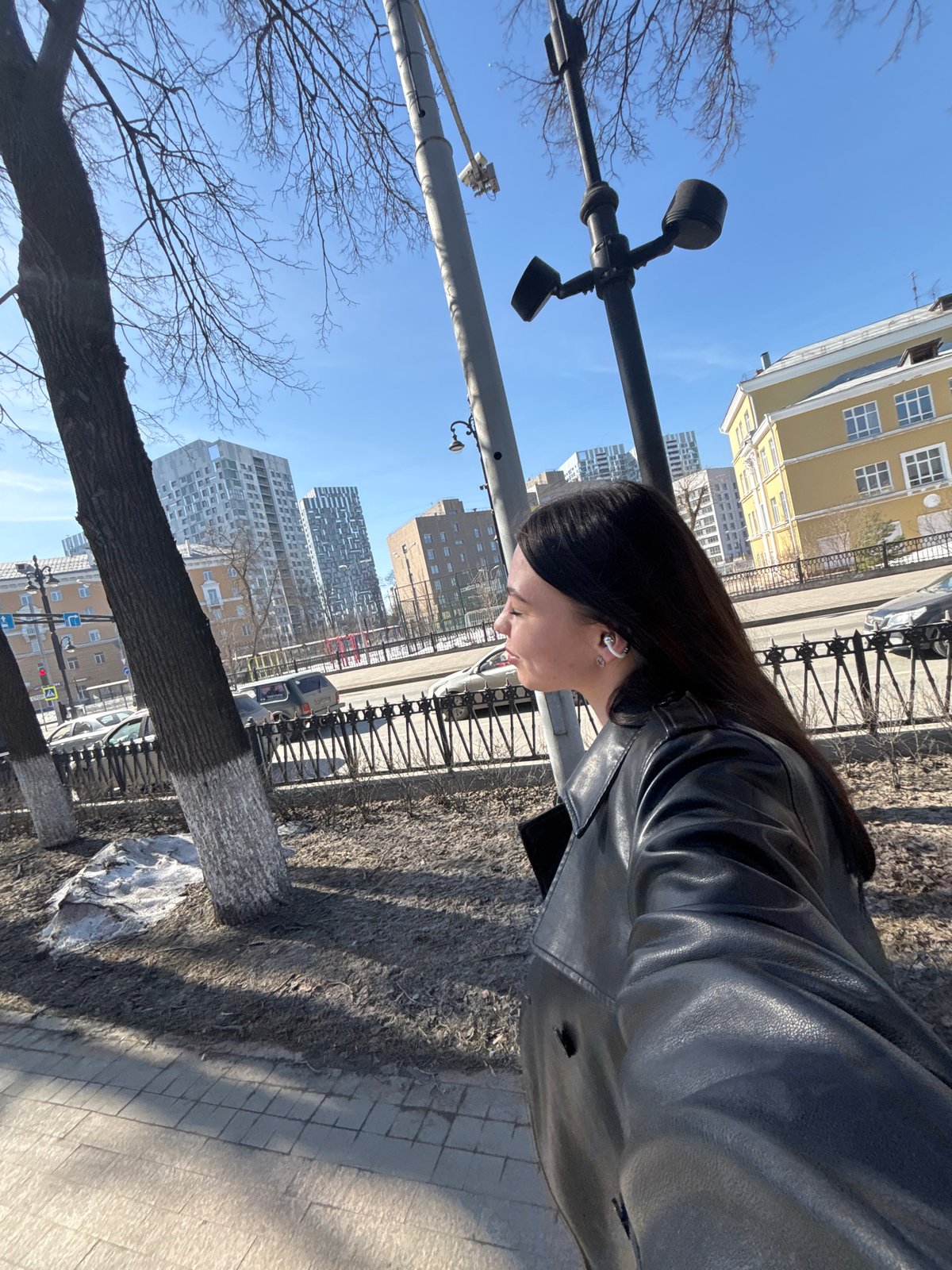 Woman in leather jacket spotted on Perm sidewalk