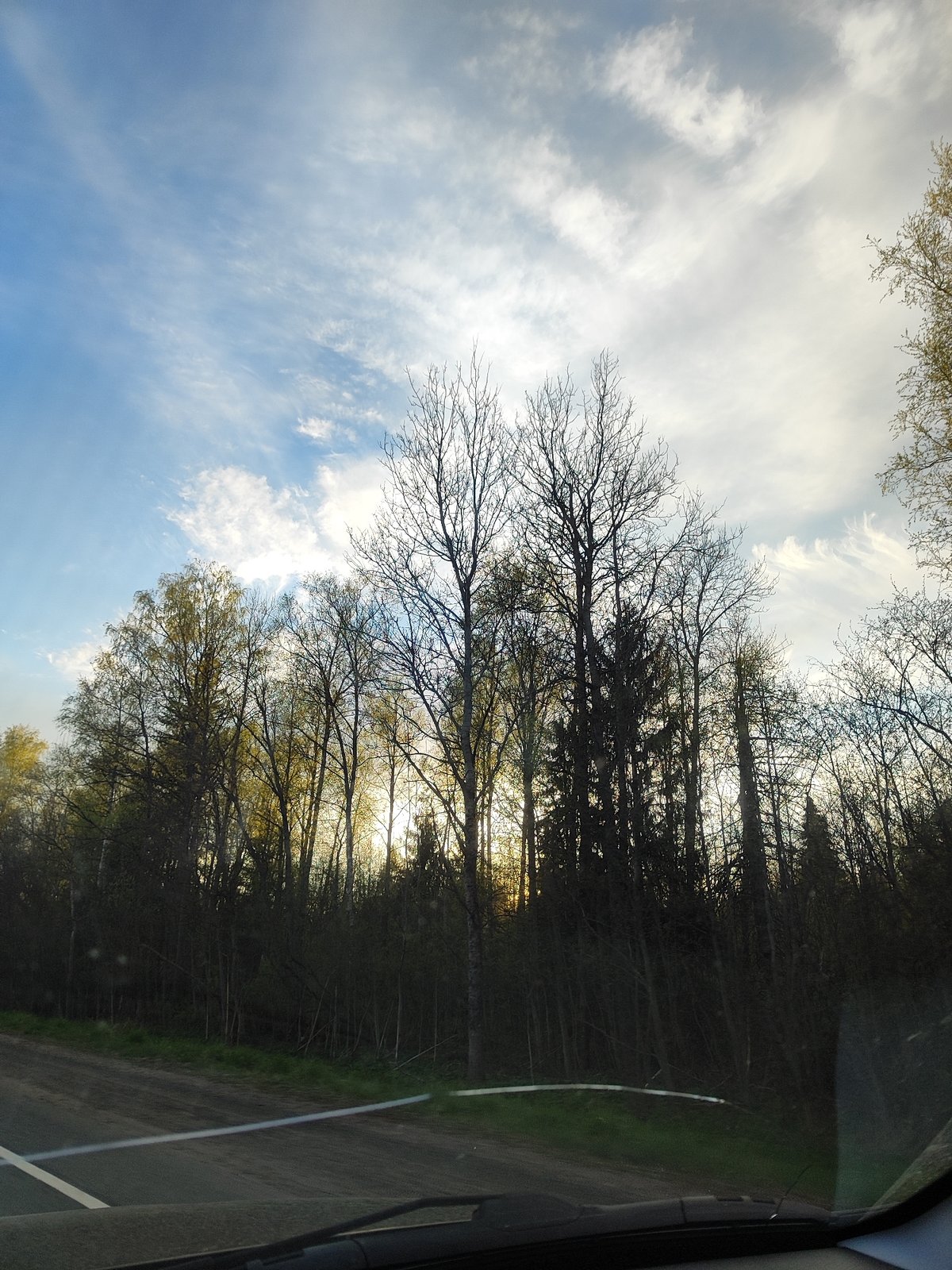 Driver Documents Roadside Sunset View During Evening Commute