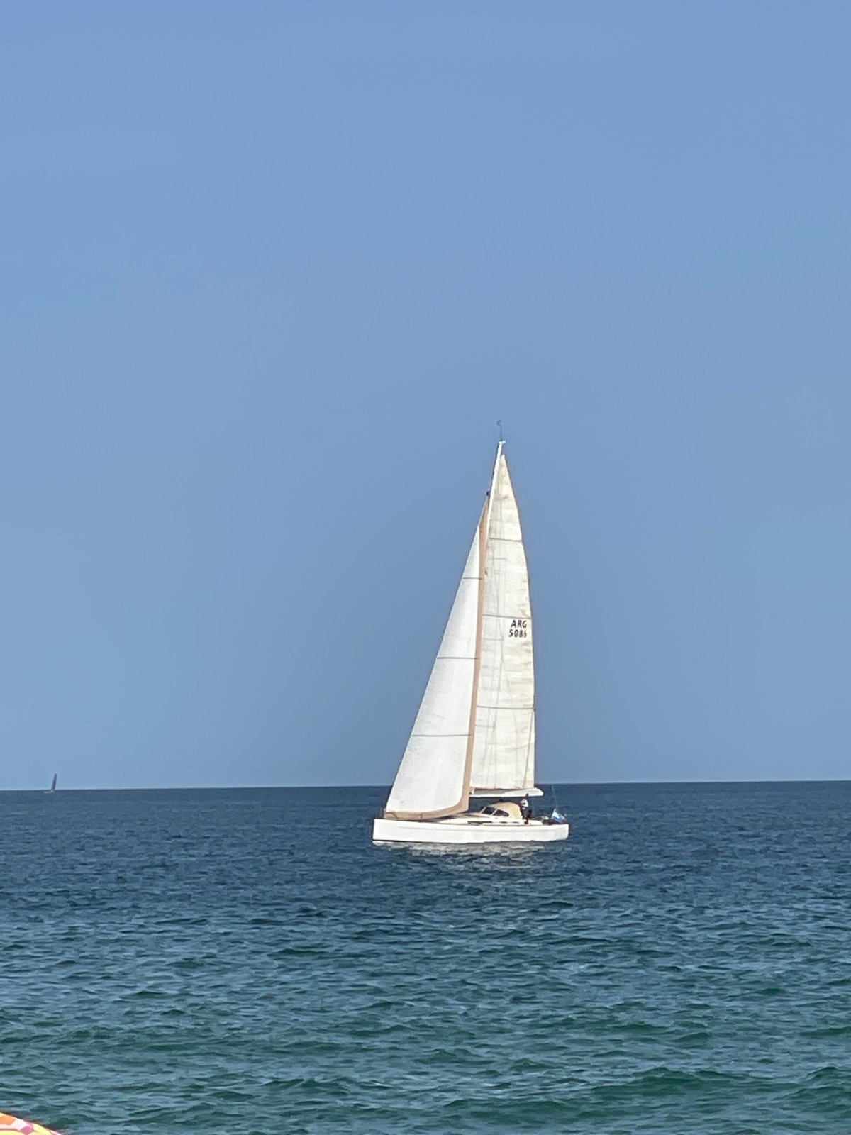 Busy summer afternoon on Badalona's Mediterranean beach