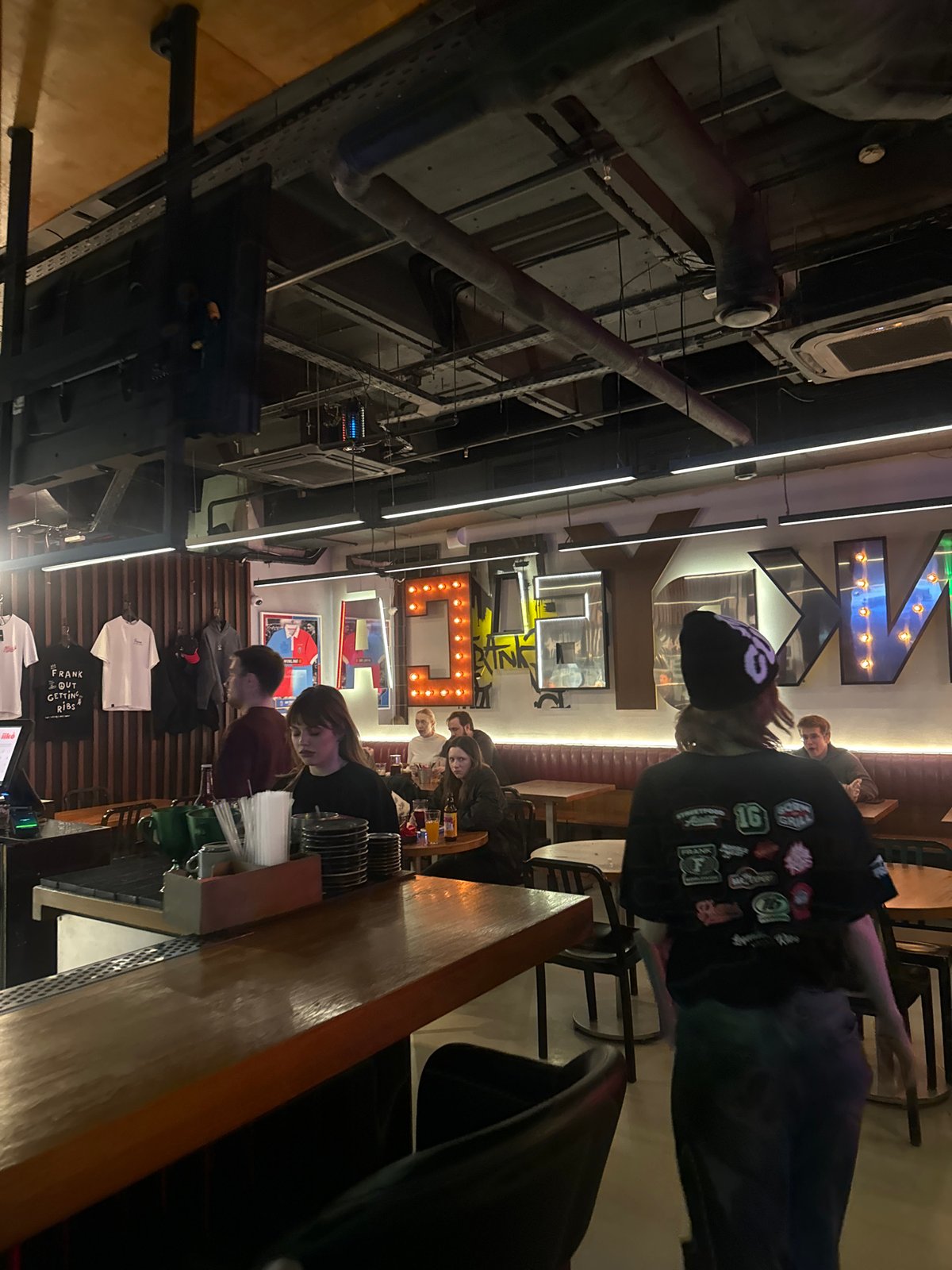 Evening scenes show illuminated Moscow structures and restaurant interior