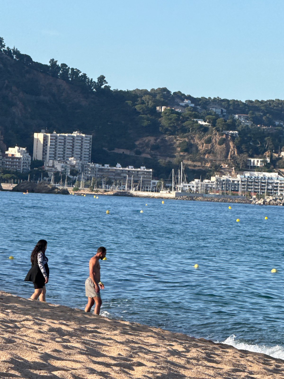Summer afternoon on the beach in Blanes, Costa Brava